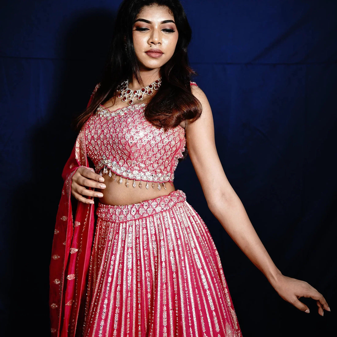 Pink designer lehenga with bridal jewellery, bridal dress rental Kerala and rental lehenga near me