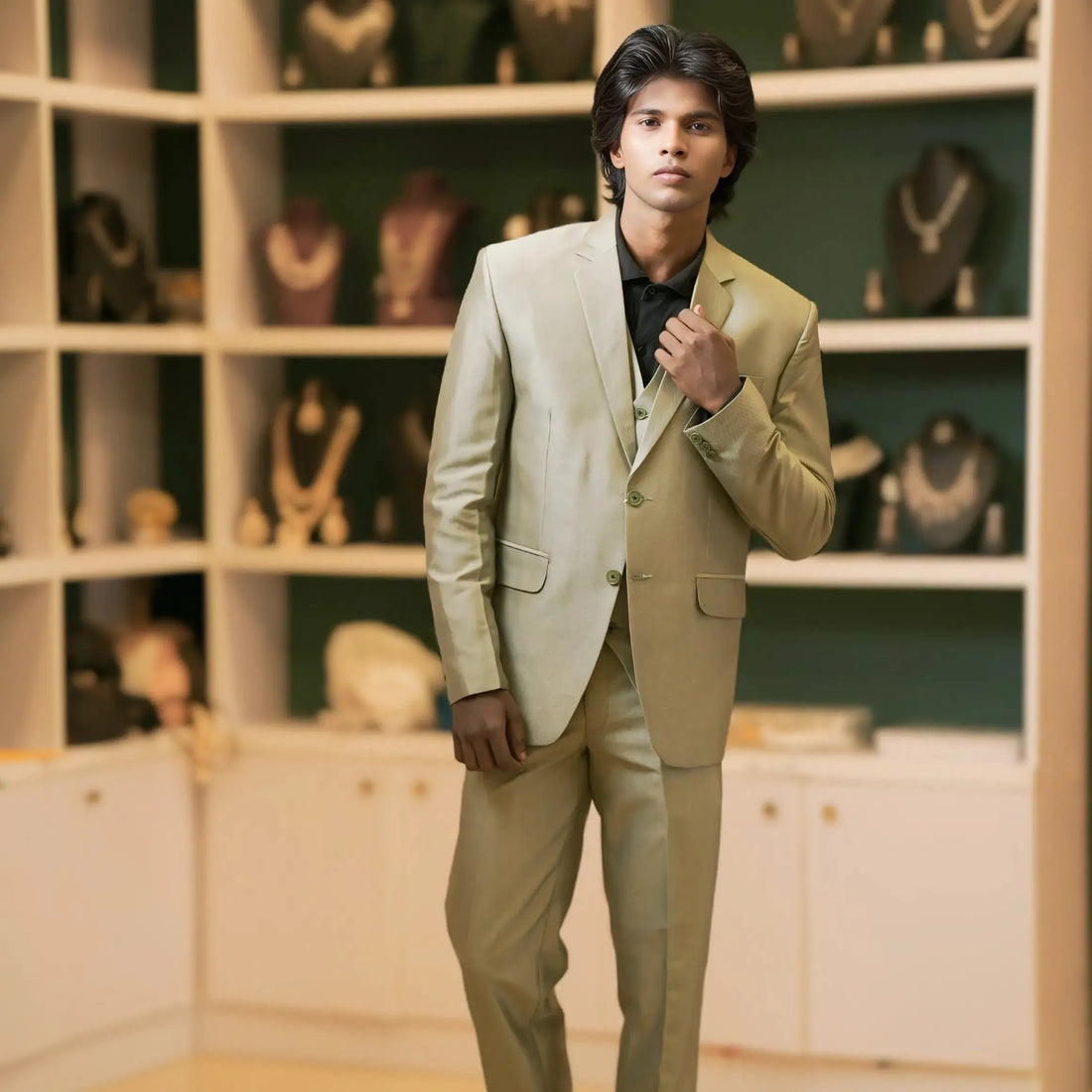 Olive Green Suit with Black Shirt: Wedding dress rental Kerala