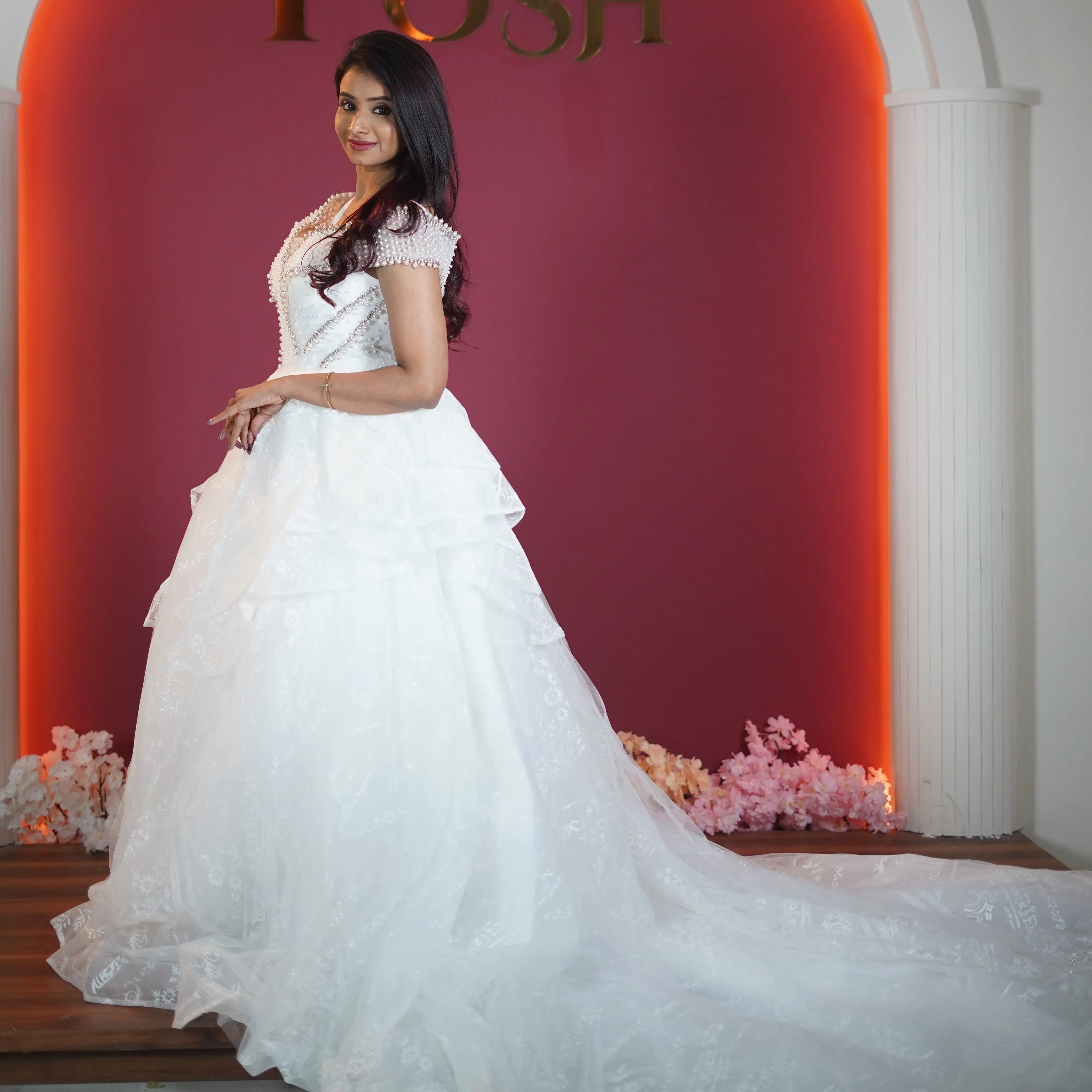 white princess bridal gown with long train available at Posh Wedding Rental Kerala bridal gown rental