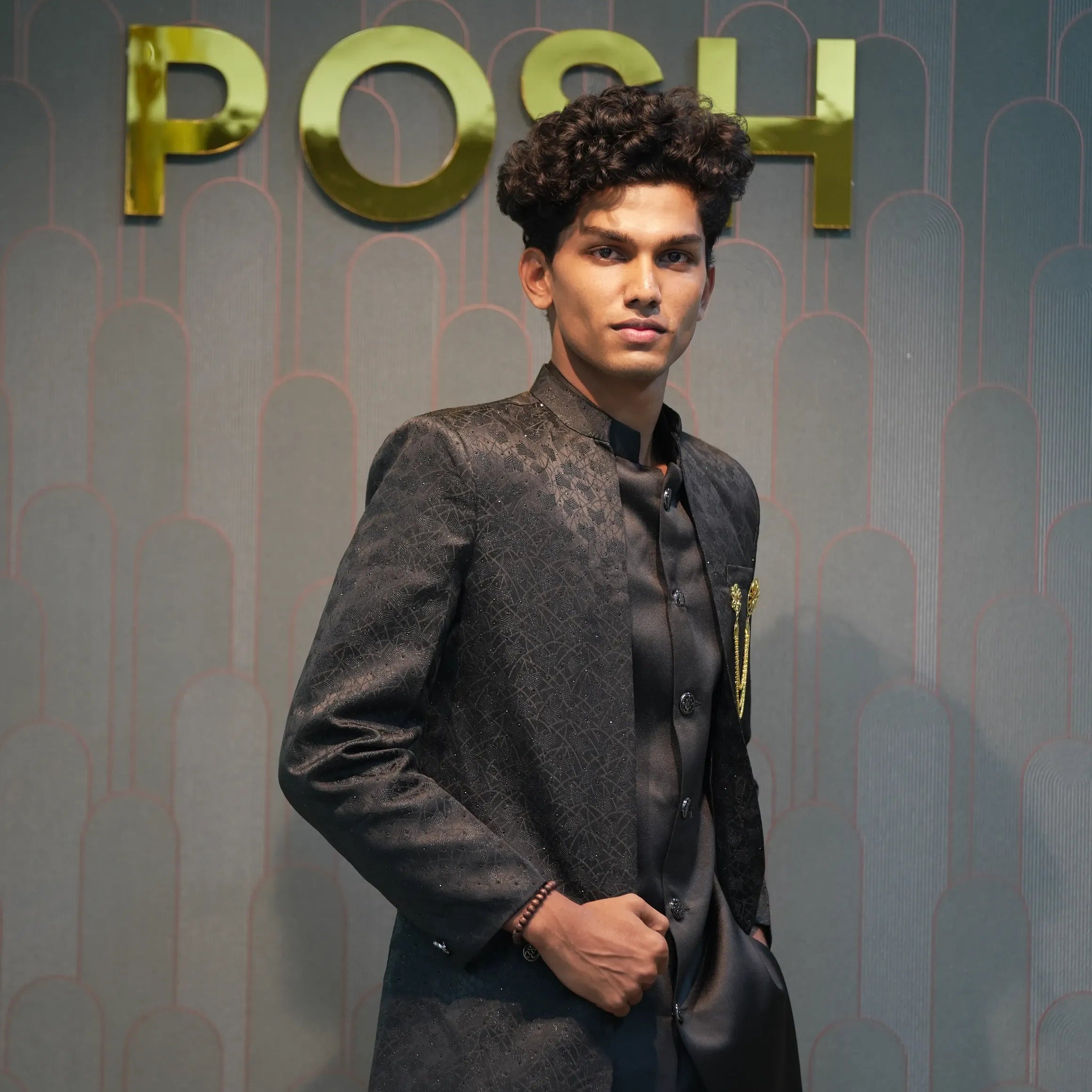 groom posing with Black Indo-Western Set
