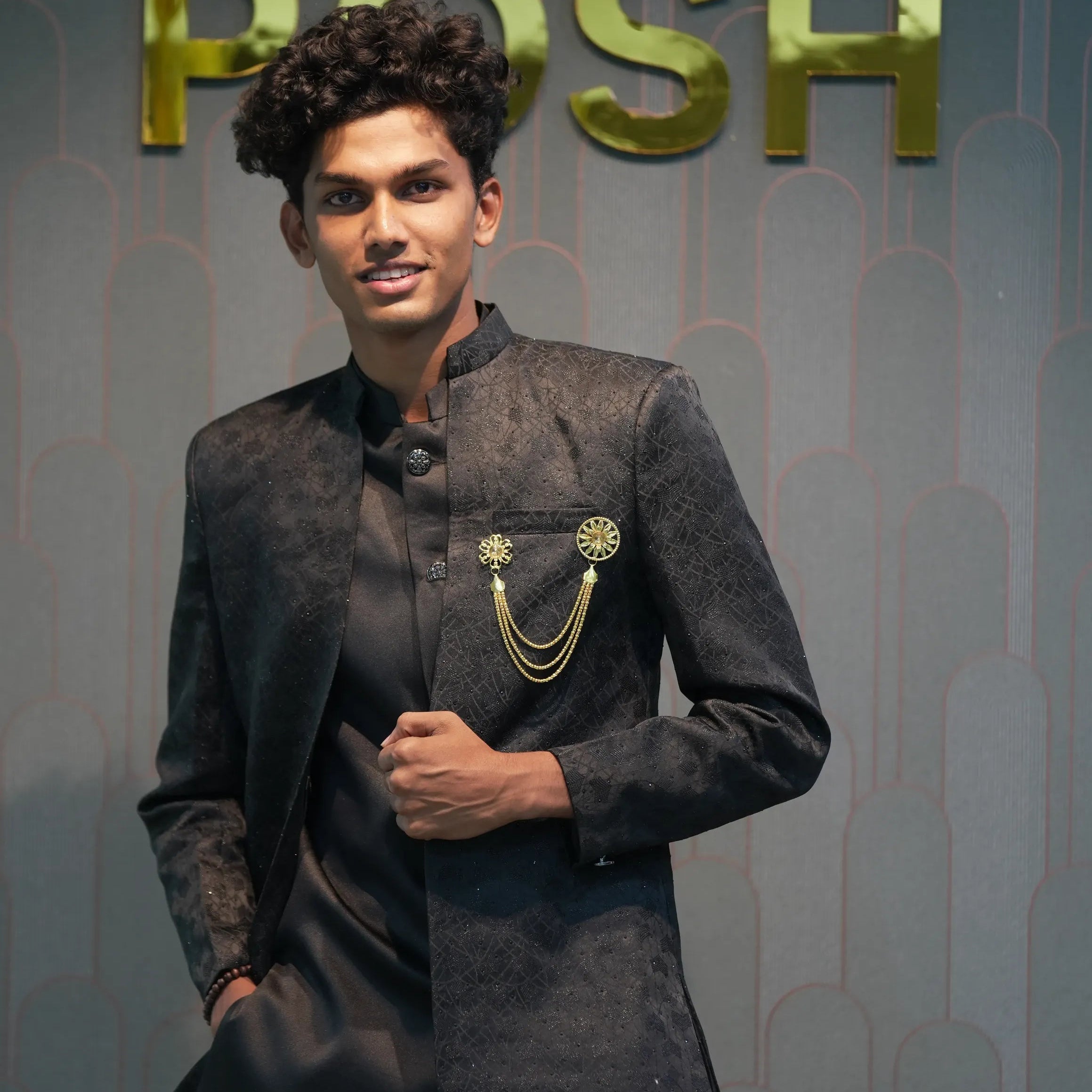 groom posing with Black Indo-Western Set
