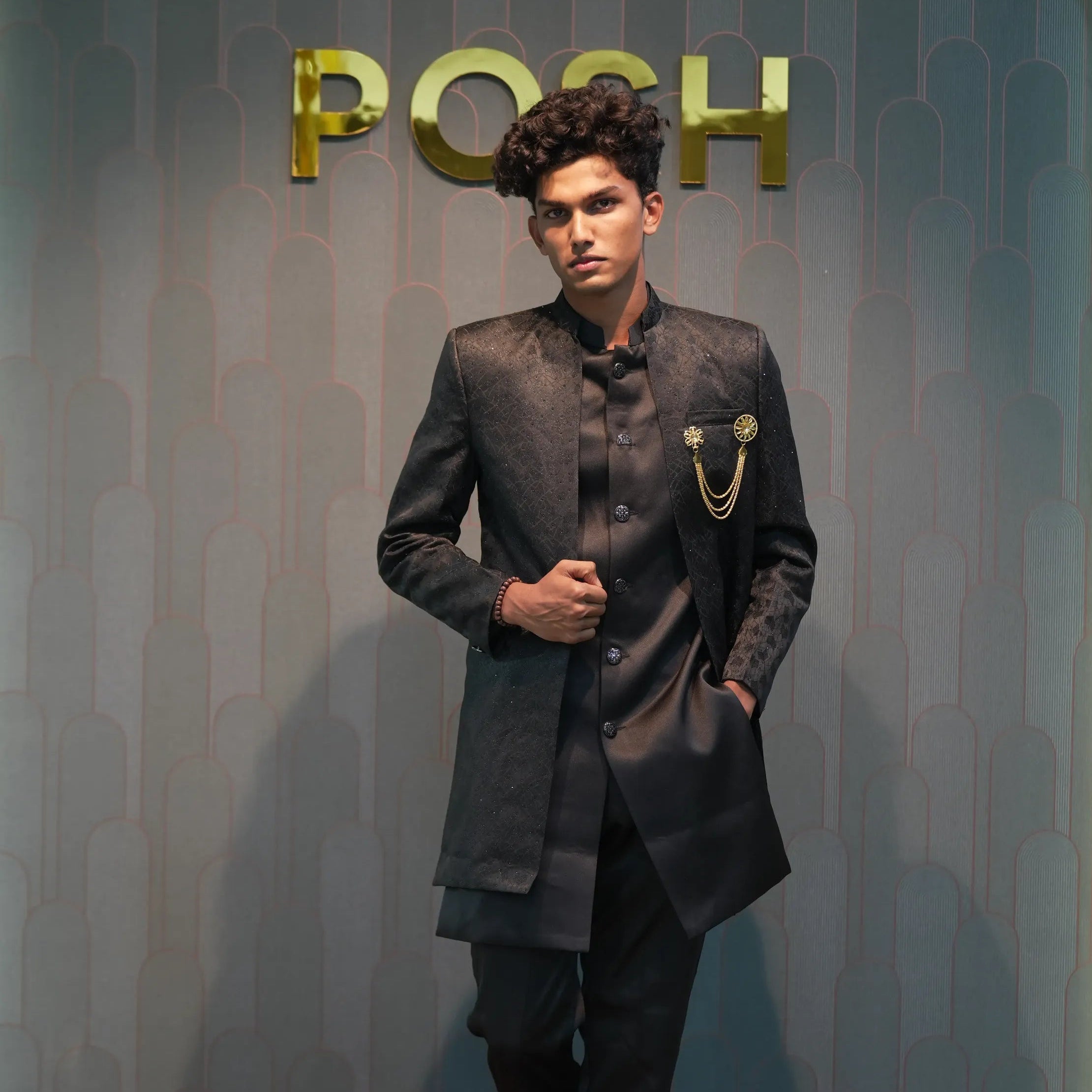 groom posing with Black Indo-Western Set
