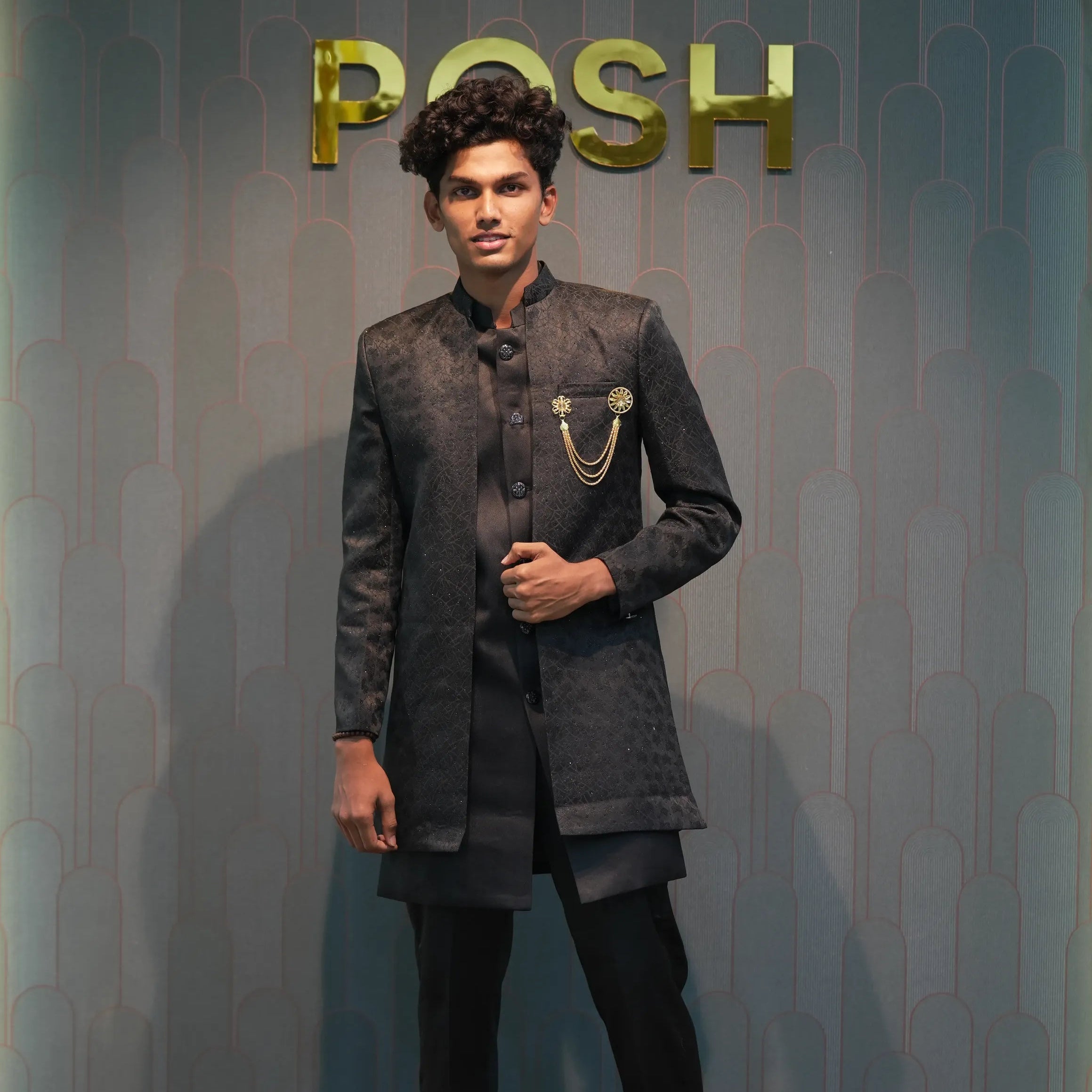 groom posing with Black Indo-Western Set
