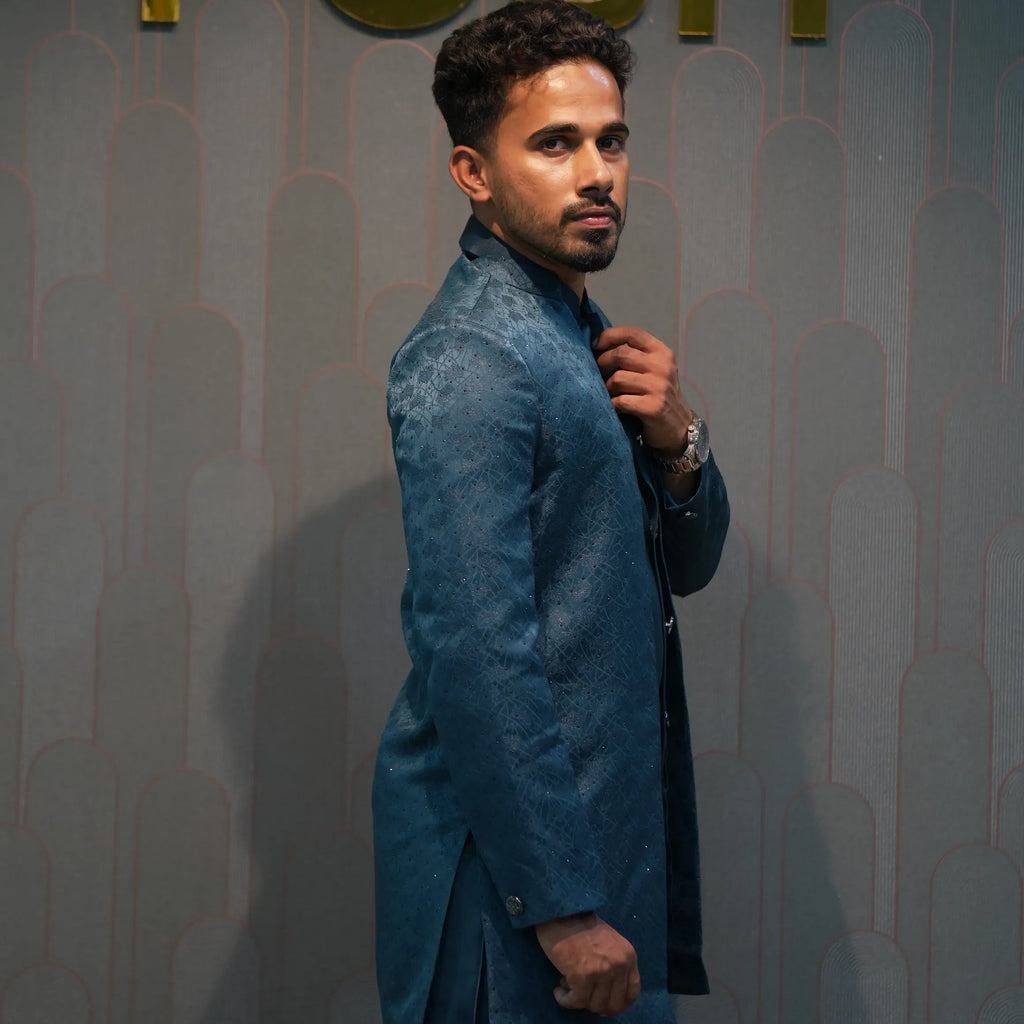 Groom wearing Dark Blue Indo-Western Set rented by posh wedding rental