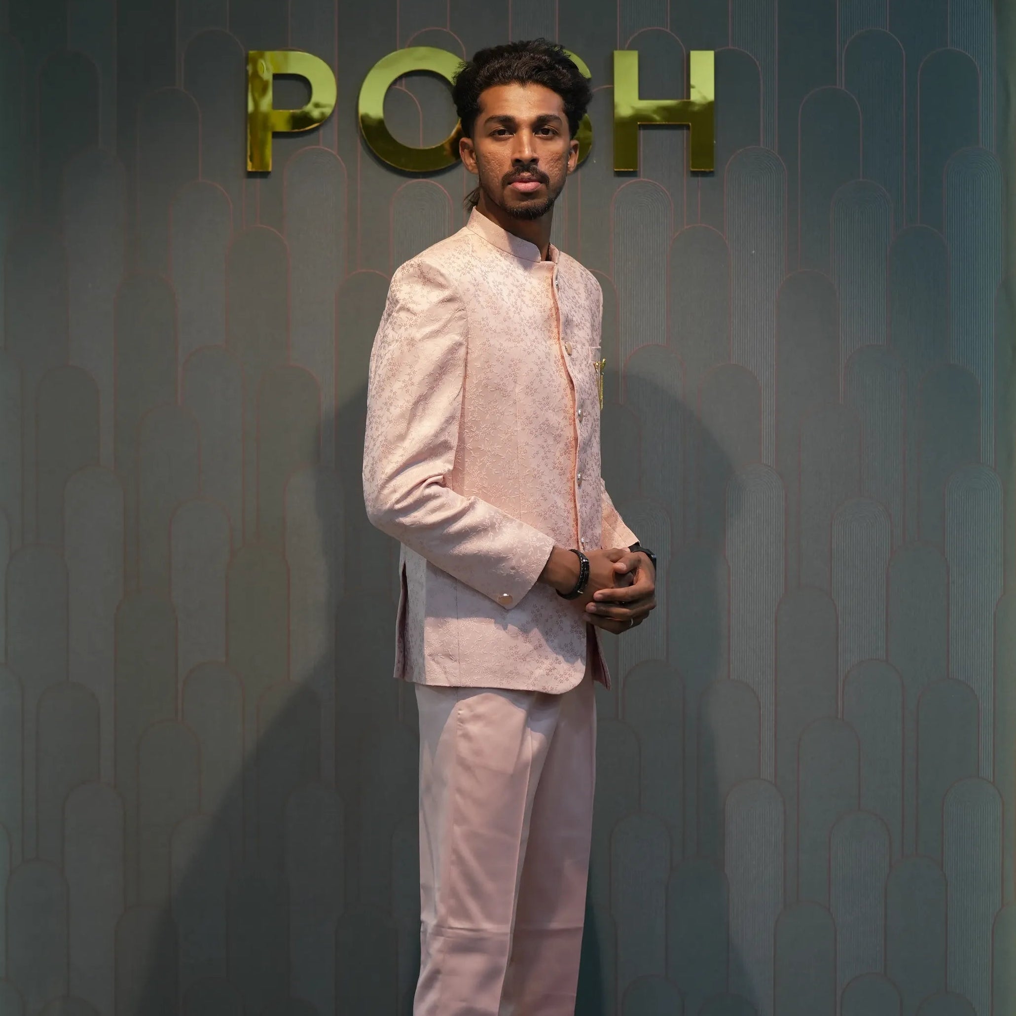 groom rented Peach Closed Jodhpuri Set for wedding