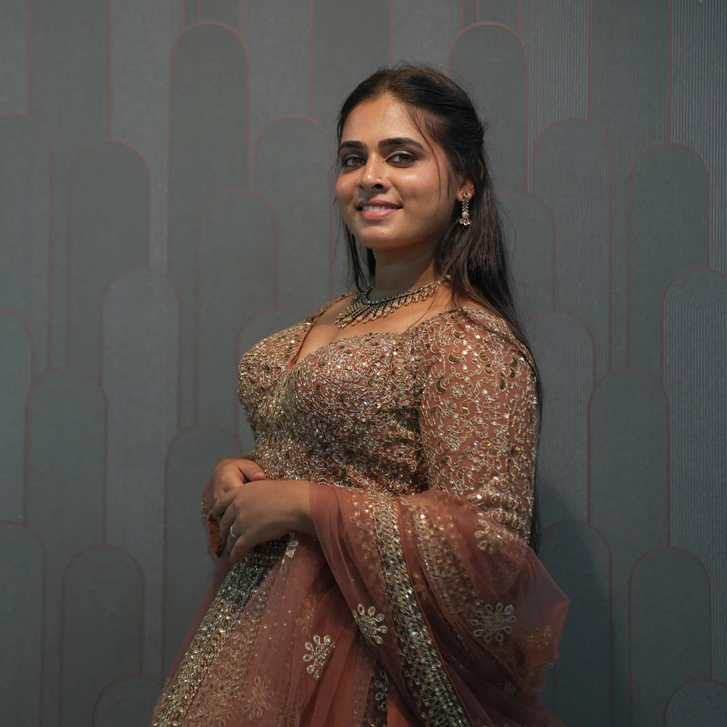 women wearing Light Brown Crop Top Lehenga for her wedding
