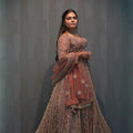 women wearing Light Brown Crop Top Lehenga for her wedding