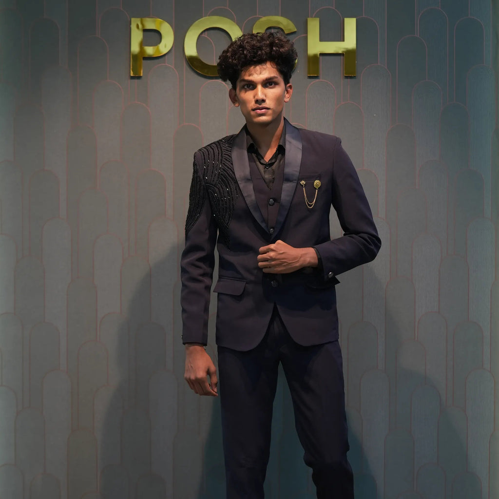 groom wearing Black Statement Tuxedo Suit