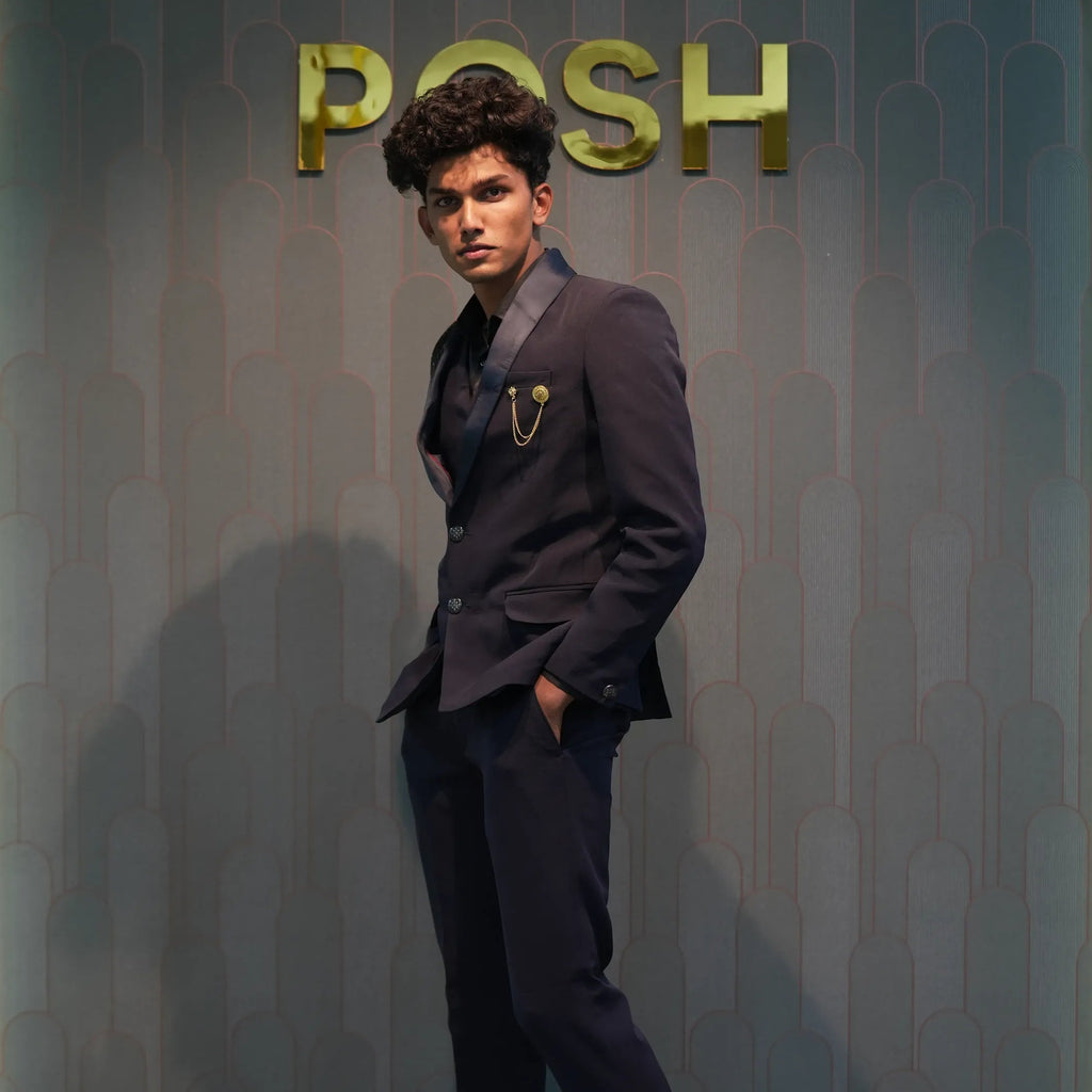 groom wearing Black Statement Tuxedo Suit