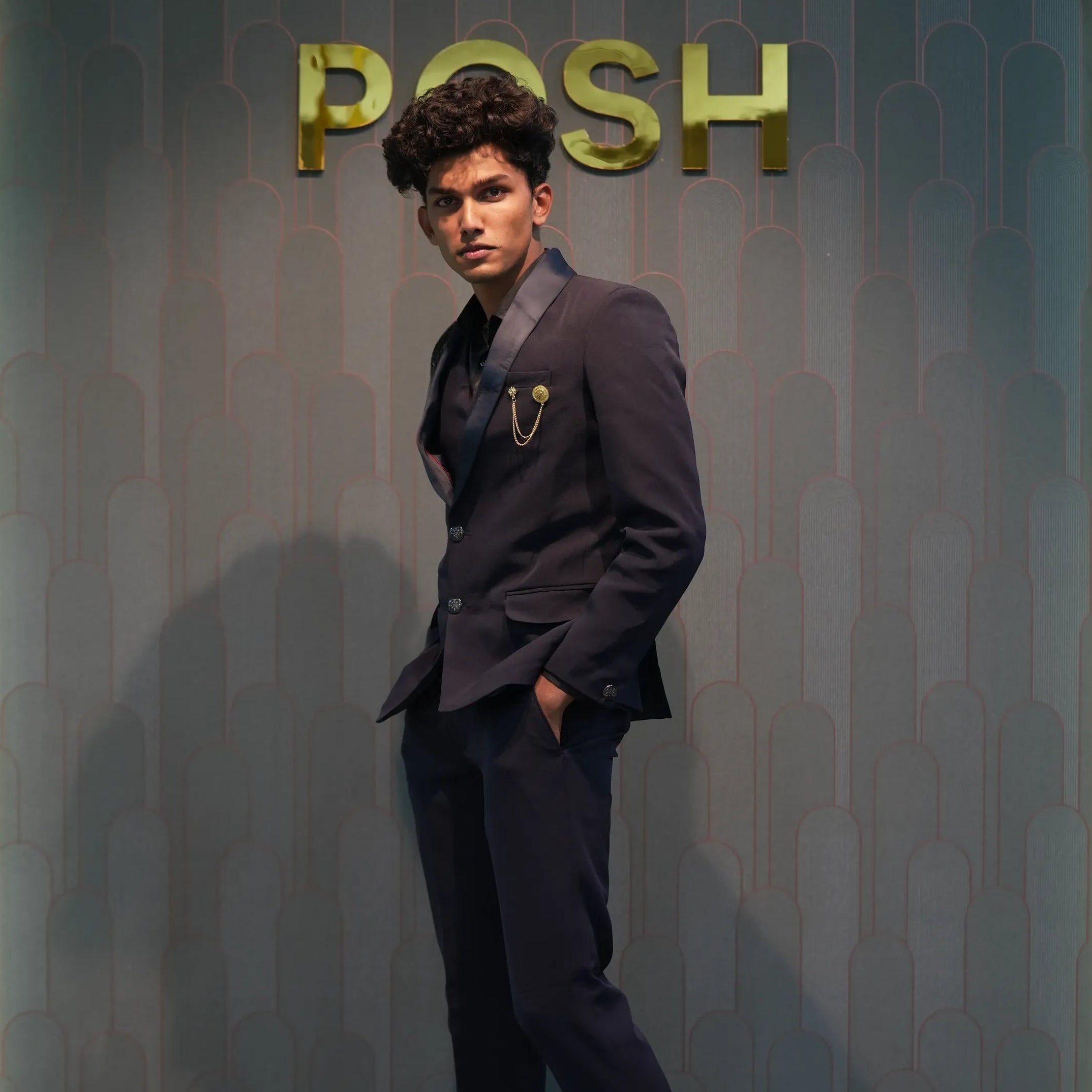 groom wearing Black Statement Tuxedo Suit