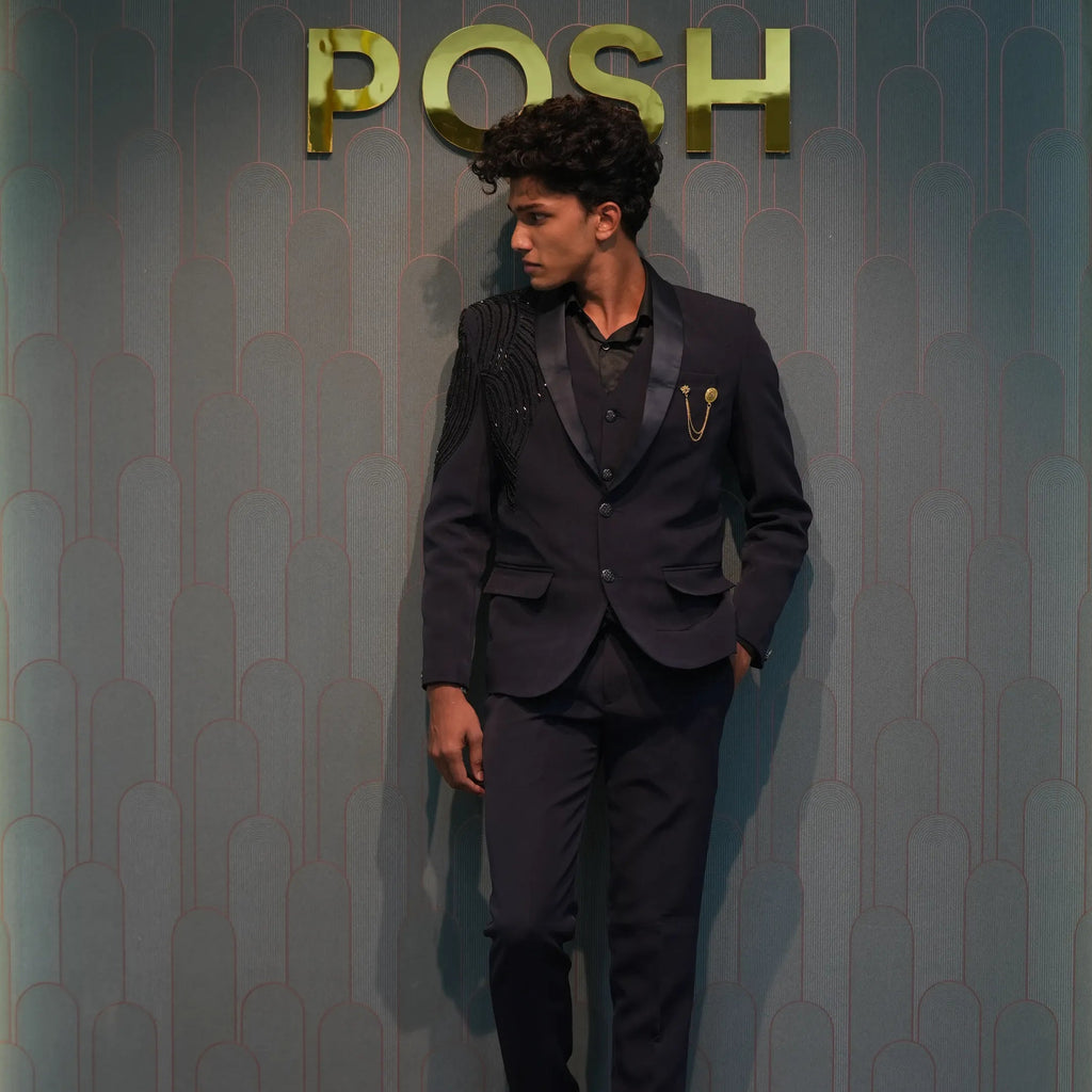 groom wearing Black Statement Tuxedo Suit