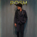 groom wearing Black Statement Tuxedo Suit