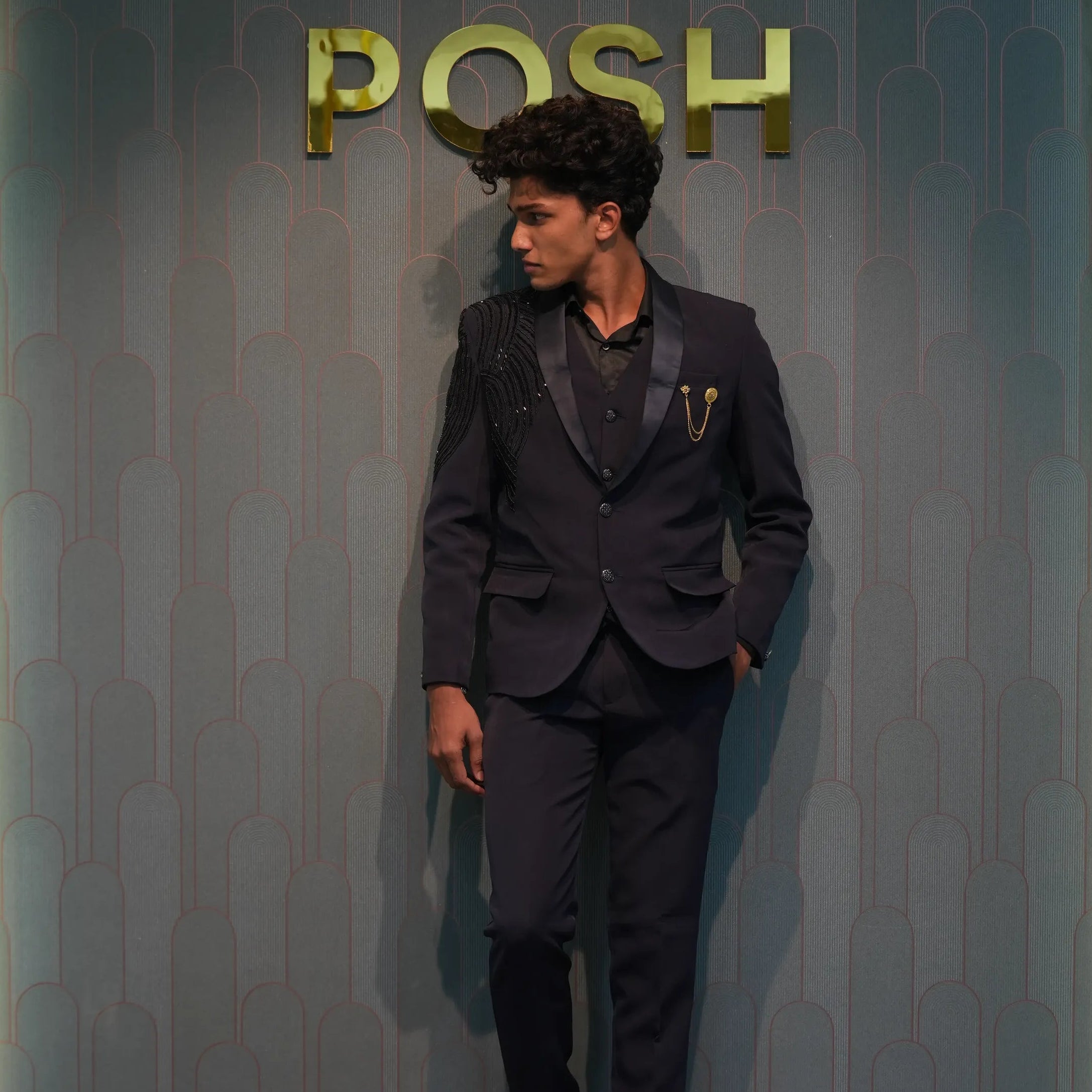 groom wearing Black Statement Tuxedo Suit