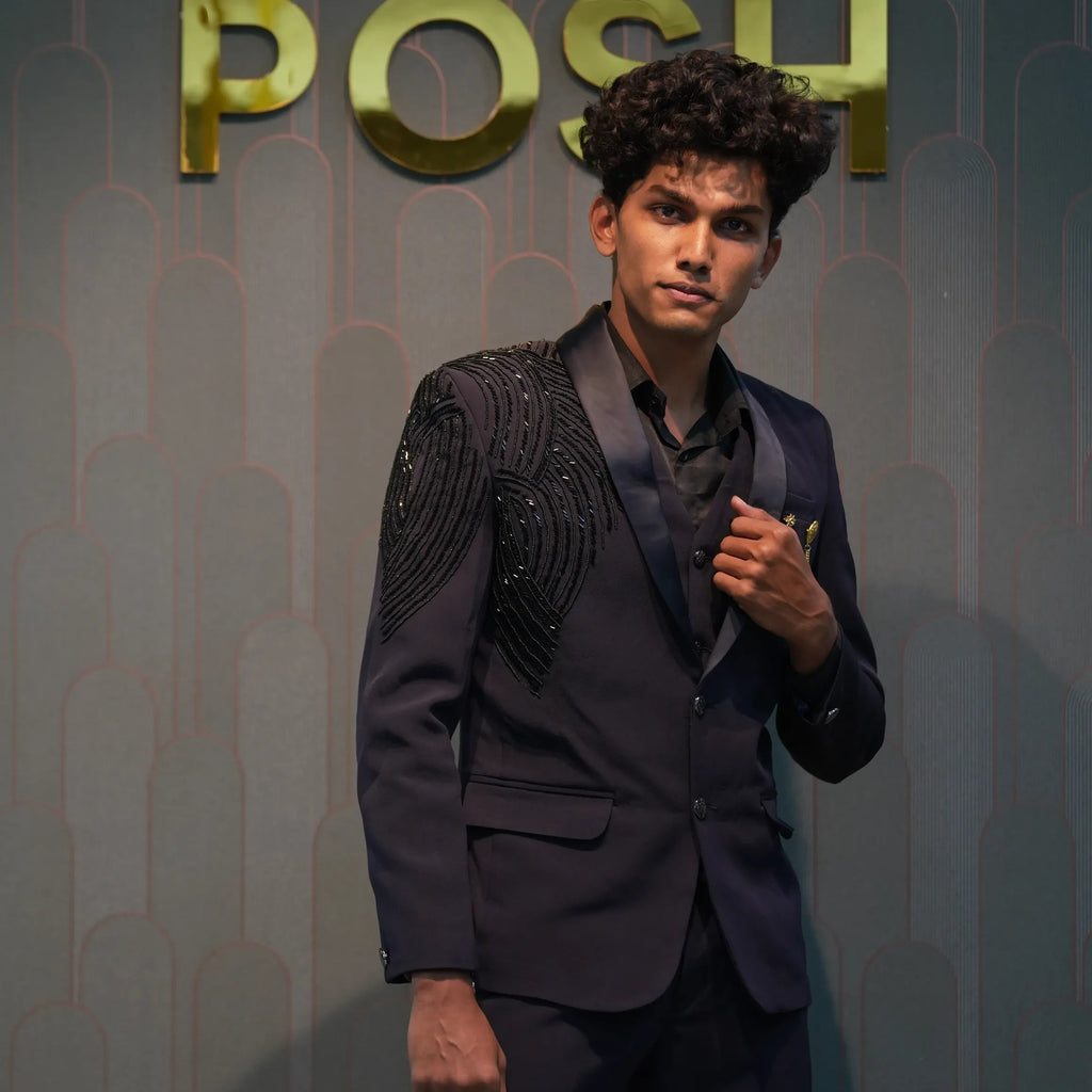 groom wearing Black Statement Tuxedo Suit