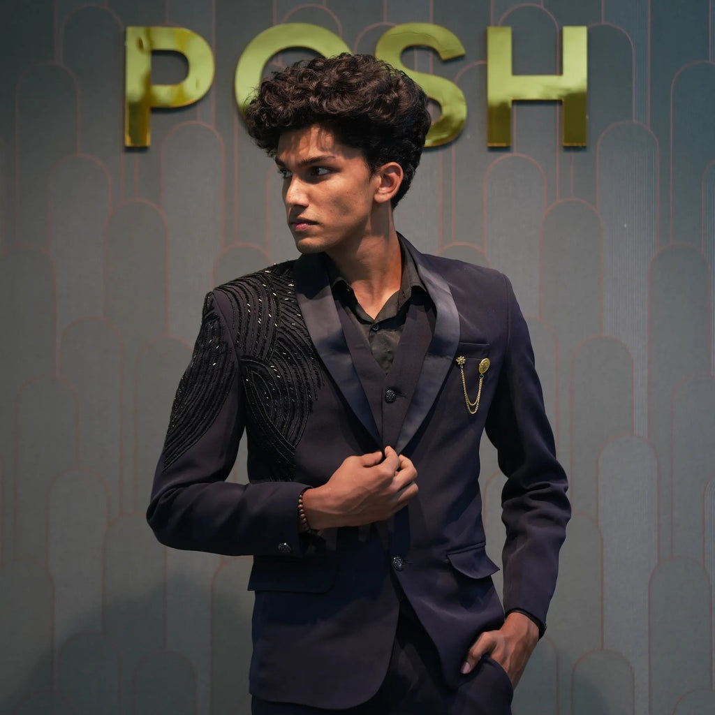 groom wearing Black Statement Tuxedo Suit