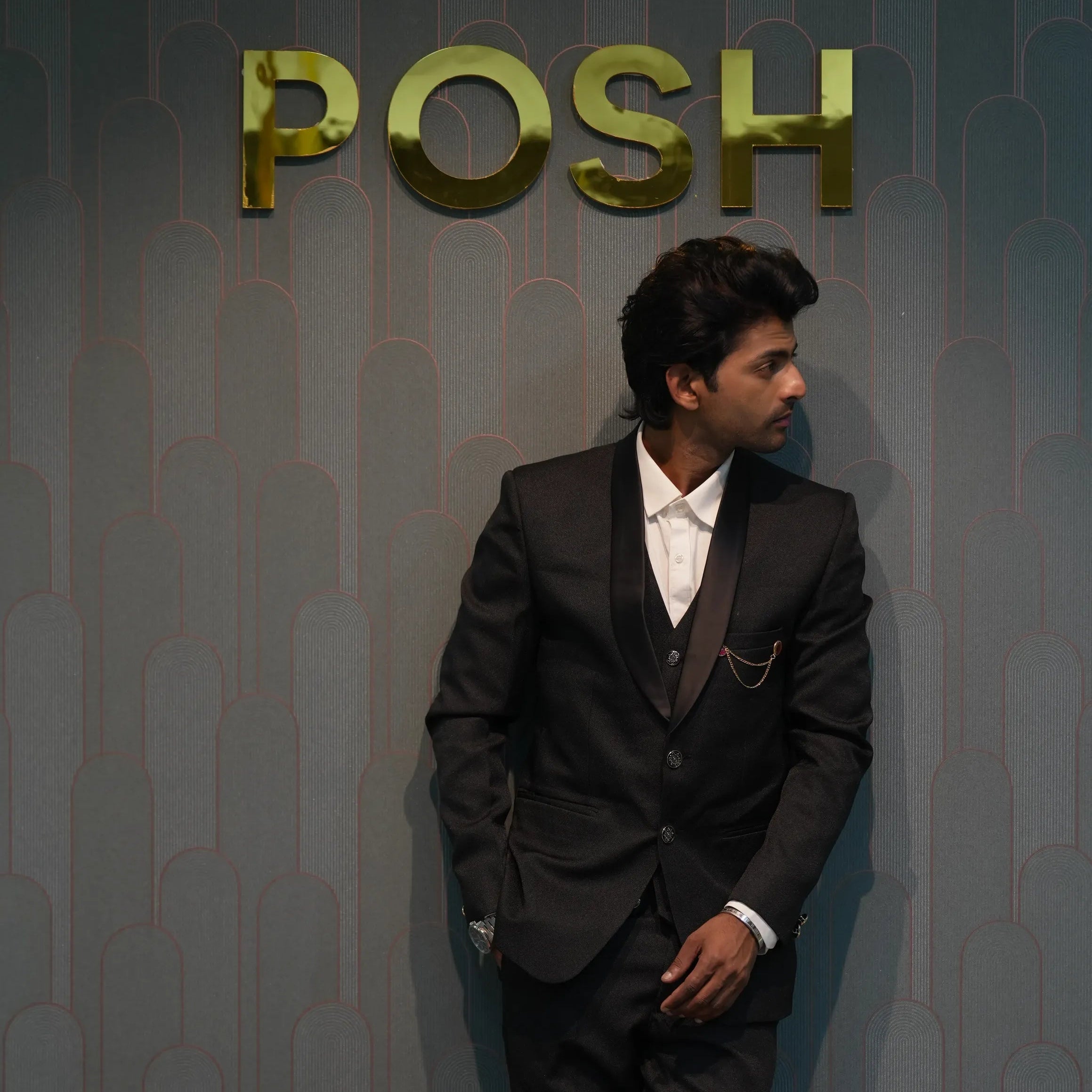 Men Wearing Black Three-Piece Groom Suit