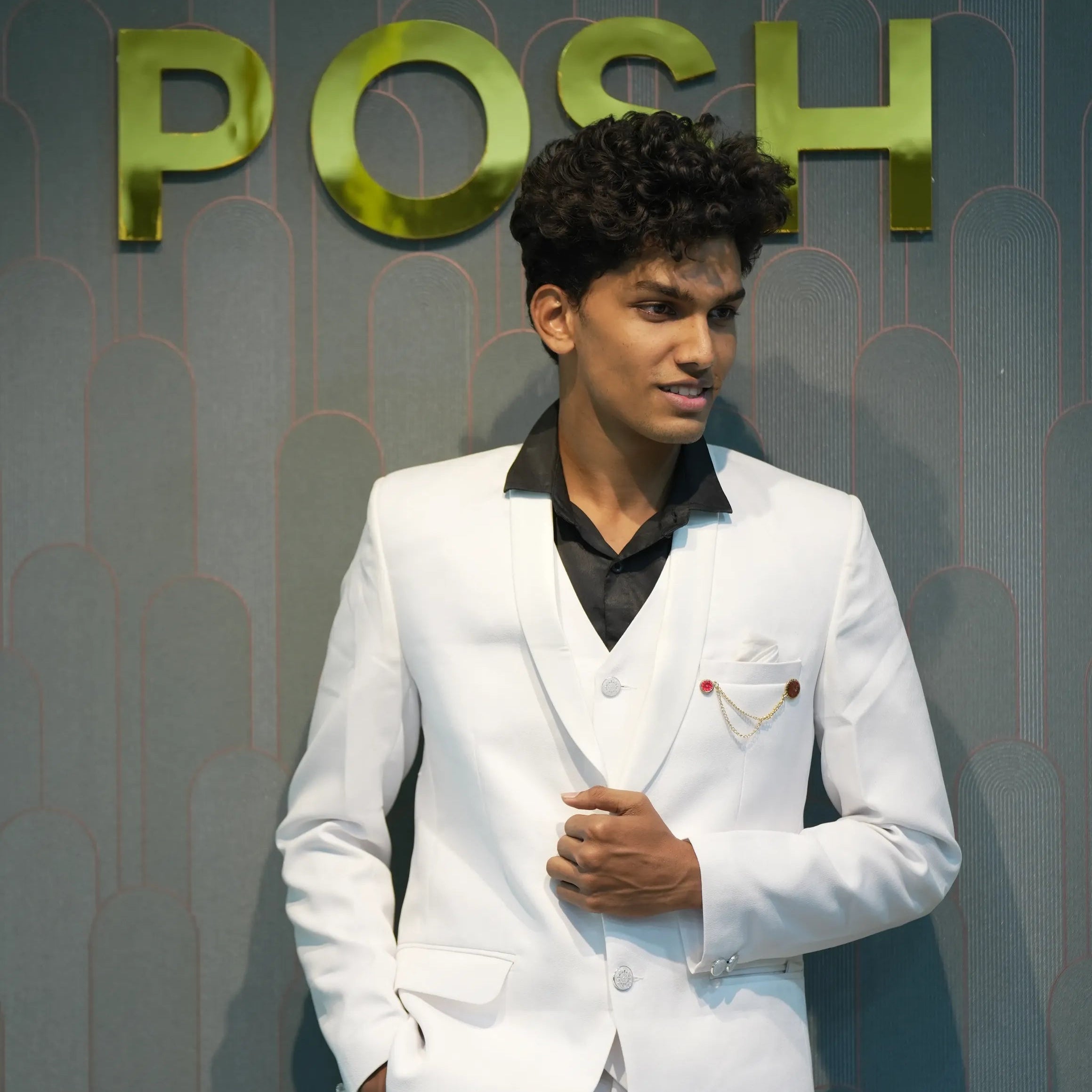 Boy wearing White Three-Piece Suit rented from Posh Wedding Rental