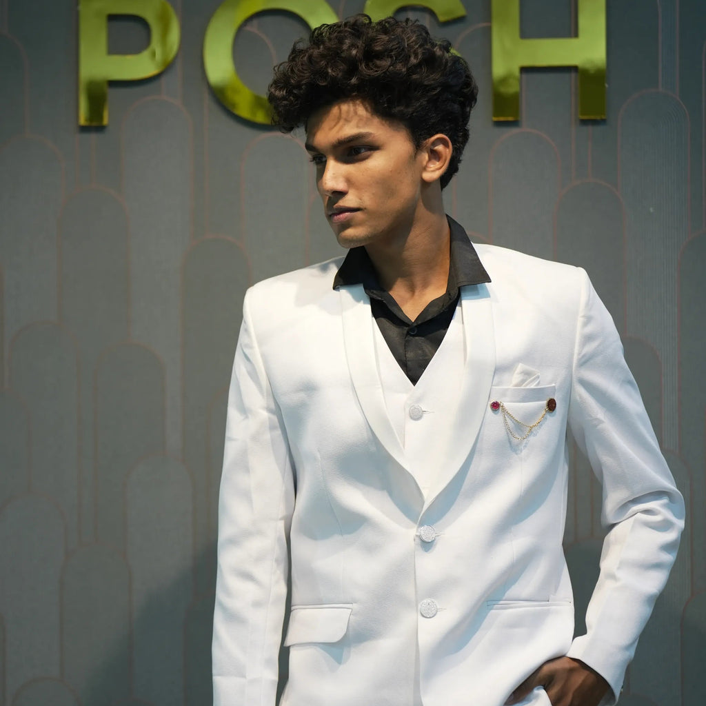 Boy wearing White Three-Piece Suit rented from Posh Wedding Rental