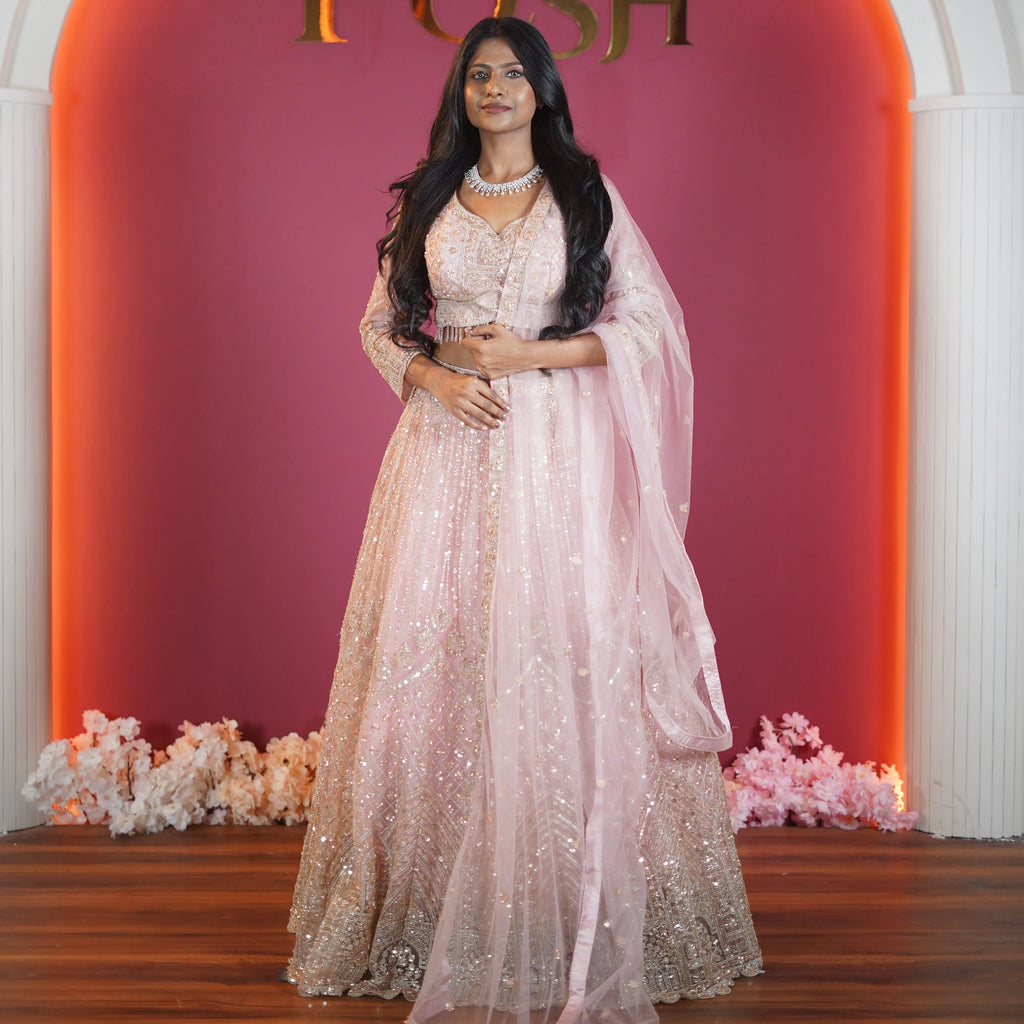 blush pink embroidered designer lehenga with dupatta available at Posh Wedding Rental Kerala lehenga rental