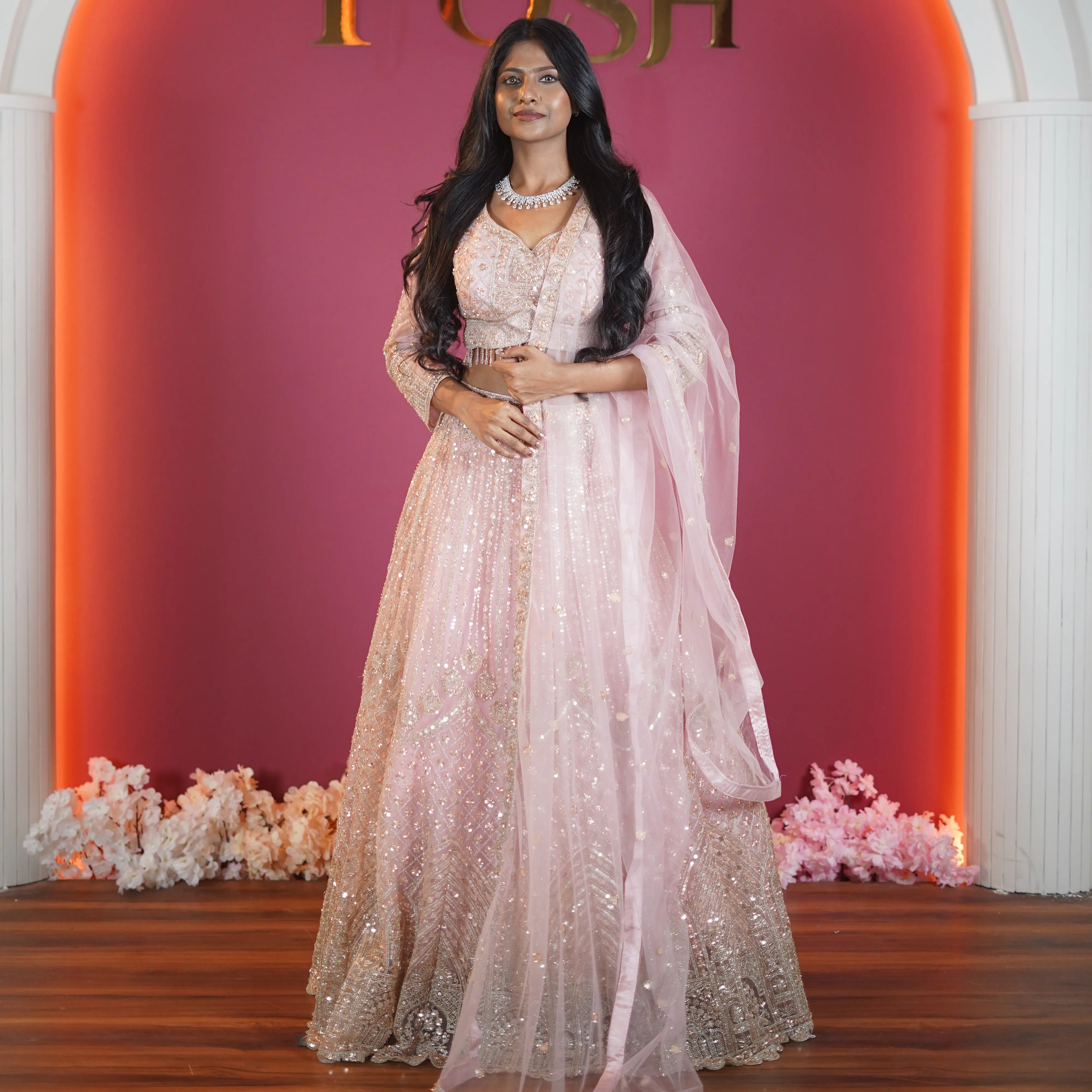 blush pink embroidered designer lehenga with dupatta available at Posh Wedding Rental Kerala lehenga rental