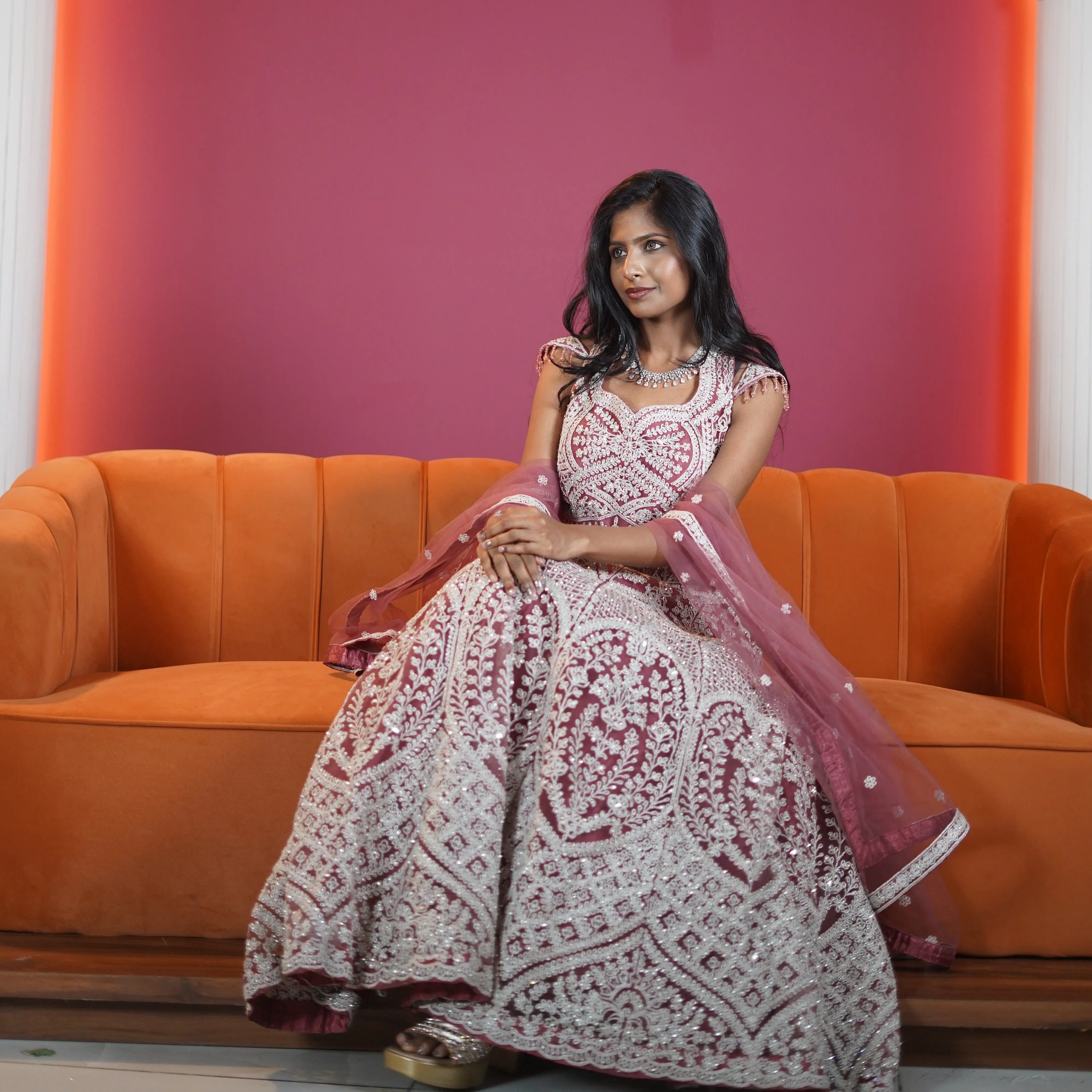 dusty rose designer bridal lehenga with heavy embroidery available at Posh Wedding Rental Kerala bridal lehenga rental