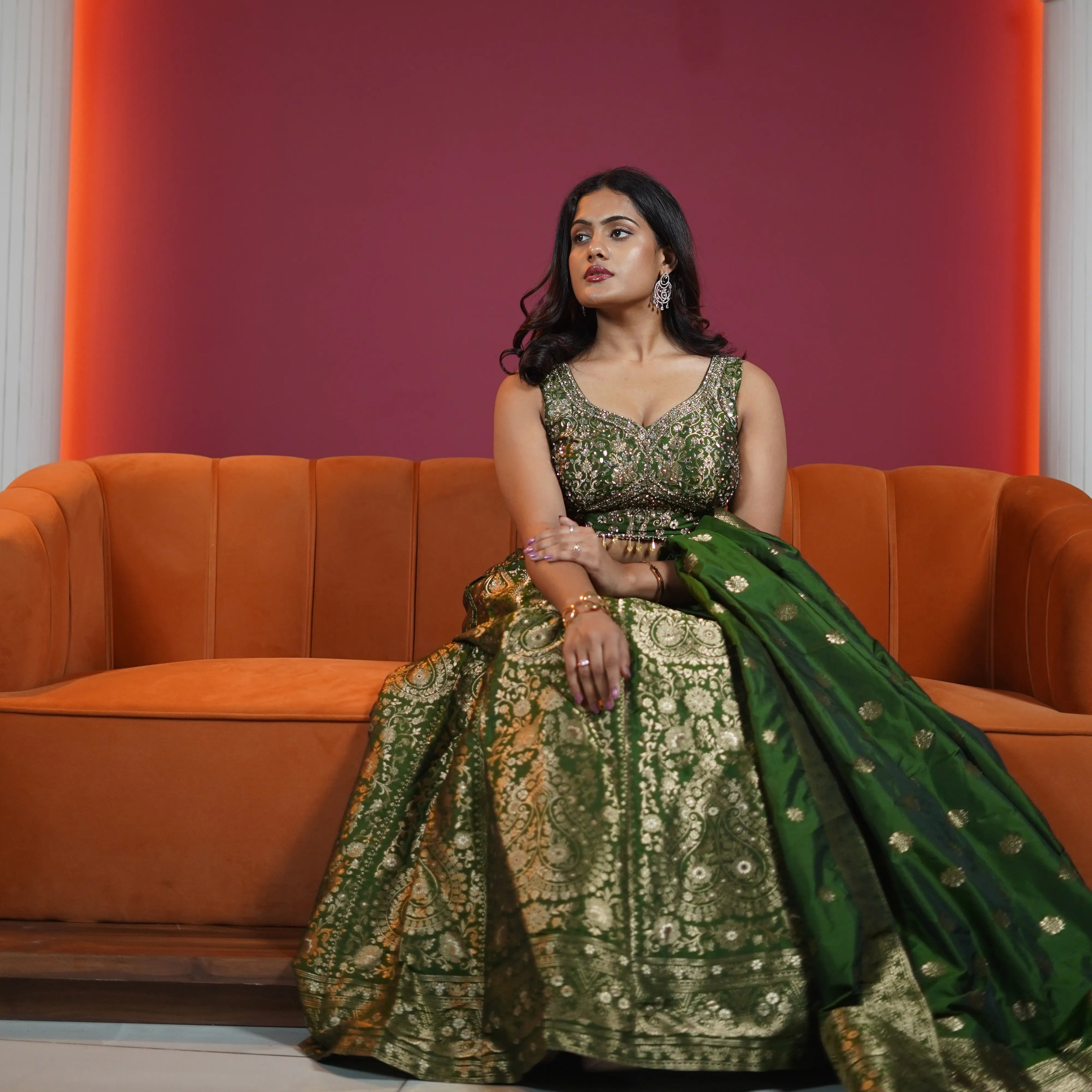 emerald green bridal lehenga with gold embroidery and dupatta available at Posh Wedding Rental Kerala lehenga rental