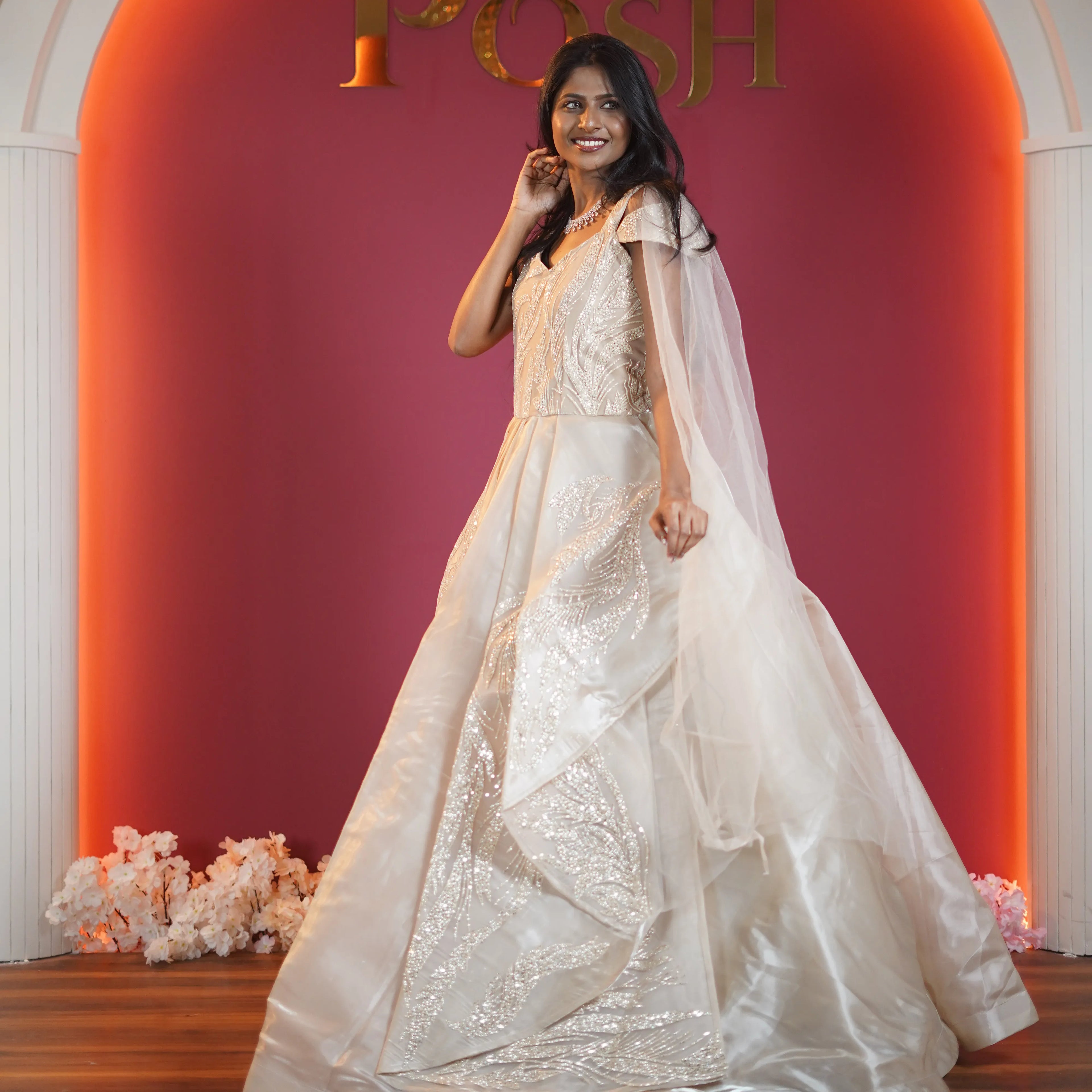 champagne gold designer bridal ball gown with veil available at Posh Wedding Rental Kerala bridal gown rental