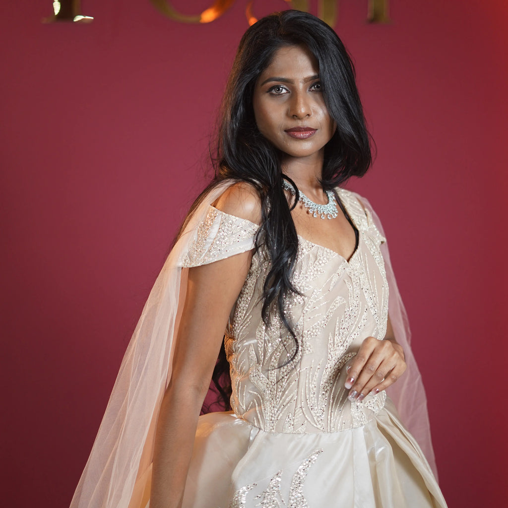 champagne gold designer bridal ball gown with veil available at Posh Wedding Rental Kerala bridal gown rental