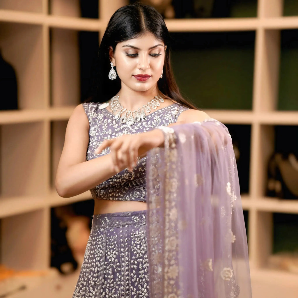 lavender bridal lehenga with silver embroidery for wedding rental kerala