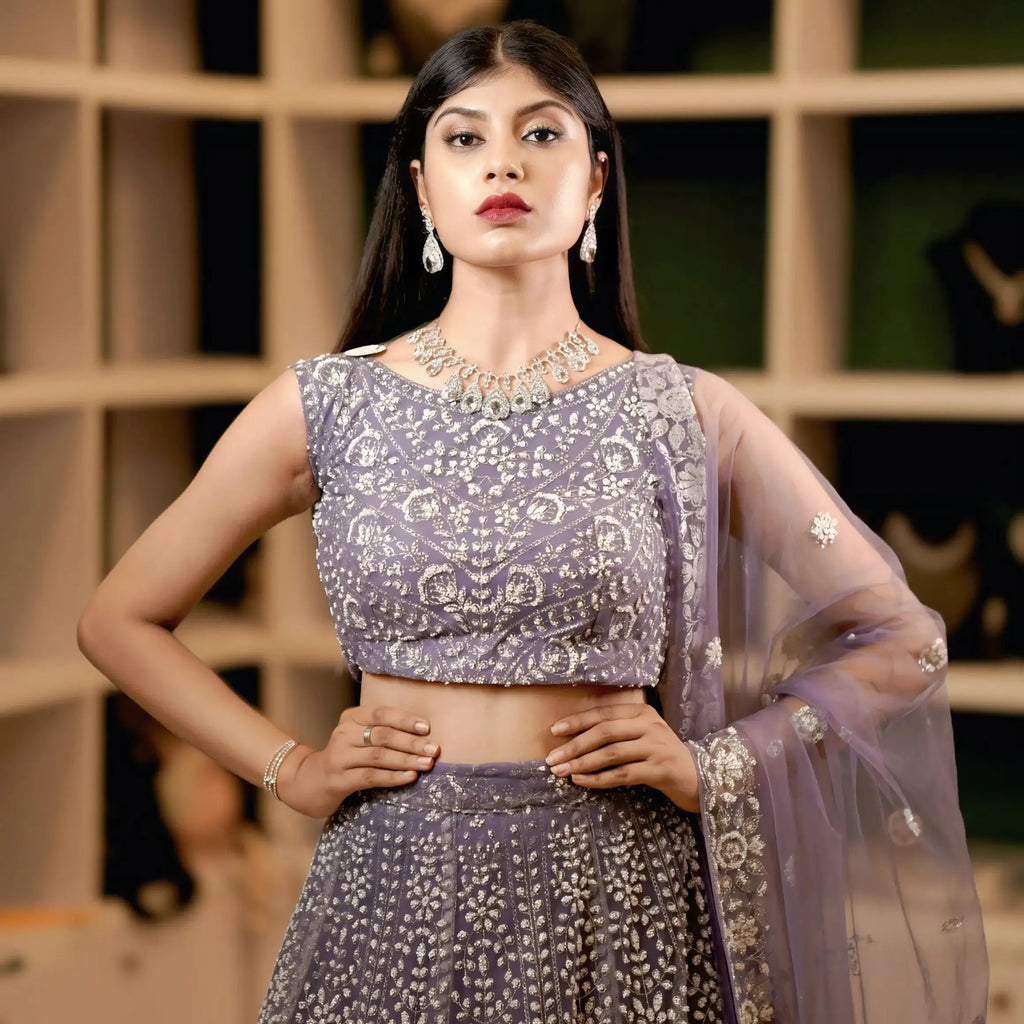 lavender bridal lehenga with silver embroidery for wedding rental kerala