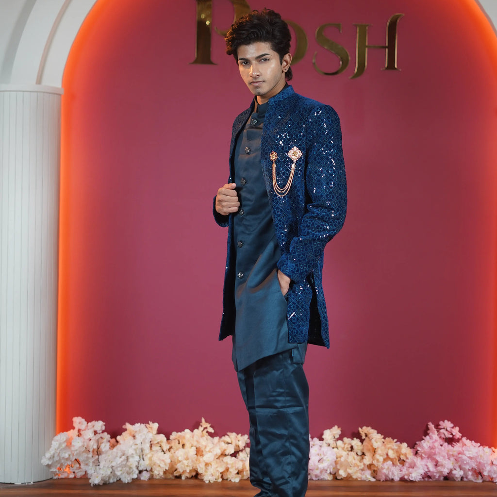Royal blue groom Indo-western outfit available on rent at Posh Wedding Rentals Kerala.
