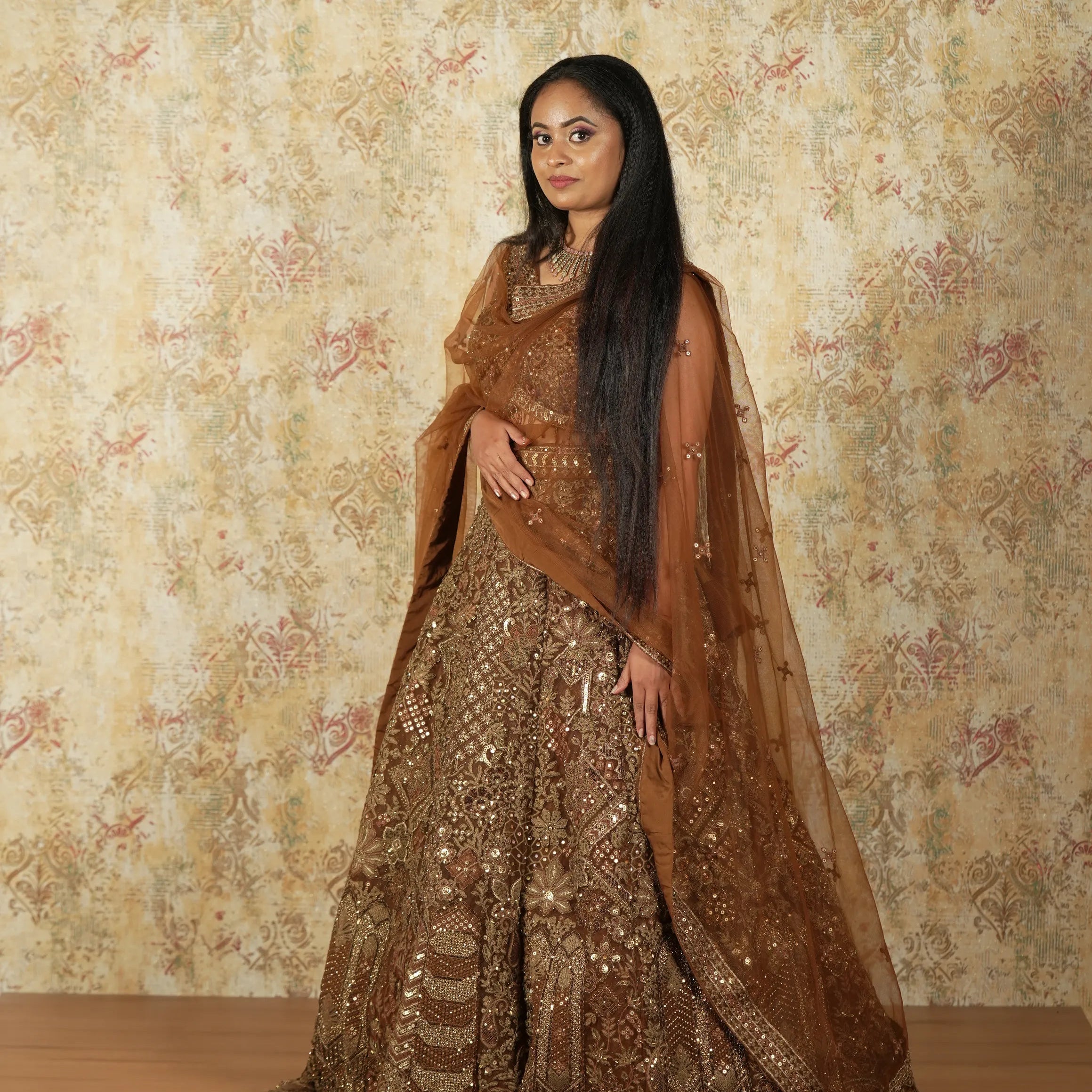 Woman in a traditional Light Coffee Crop Top Lehenga 