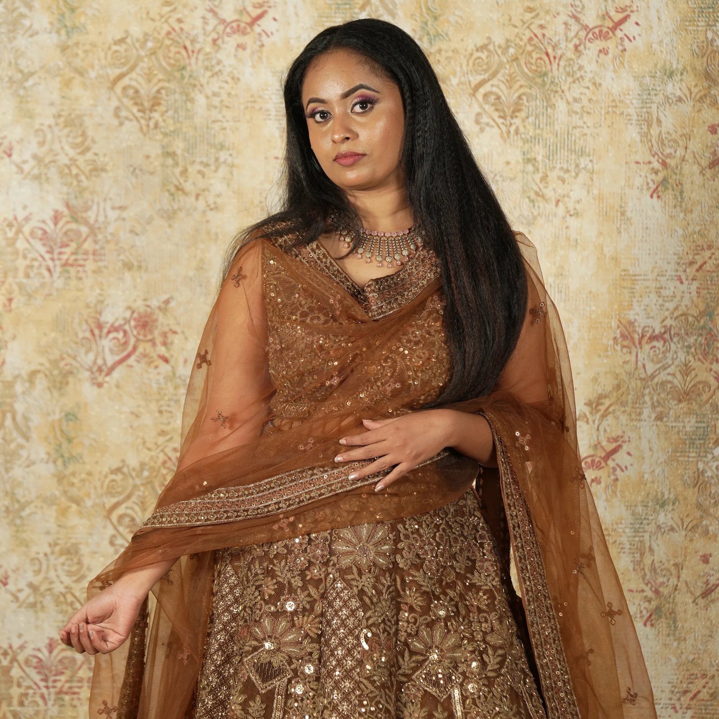 Woman in a traditional Light Coffee Crop Top Lehenga 