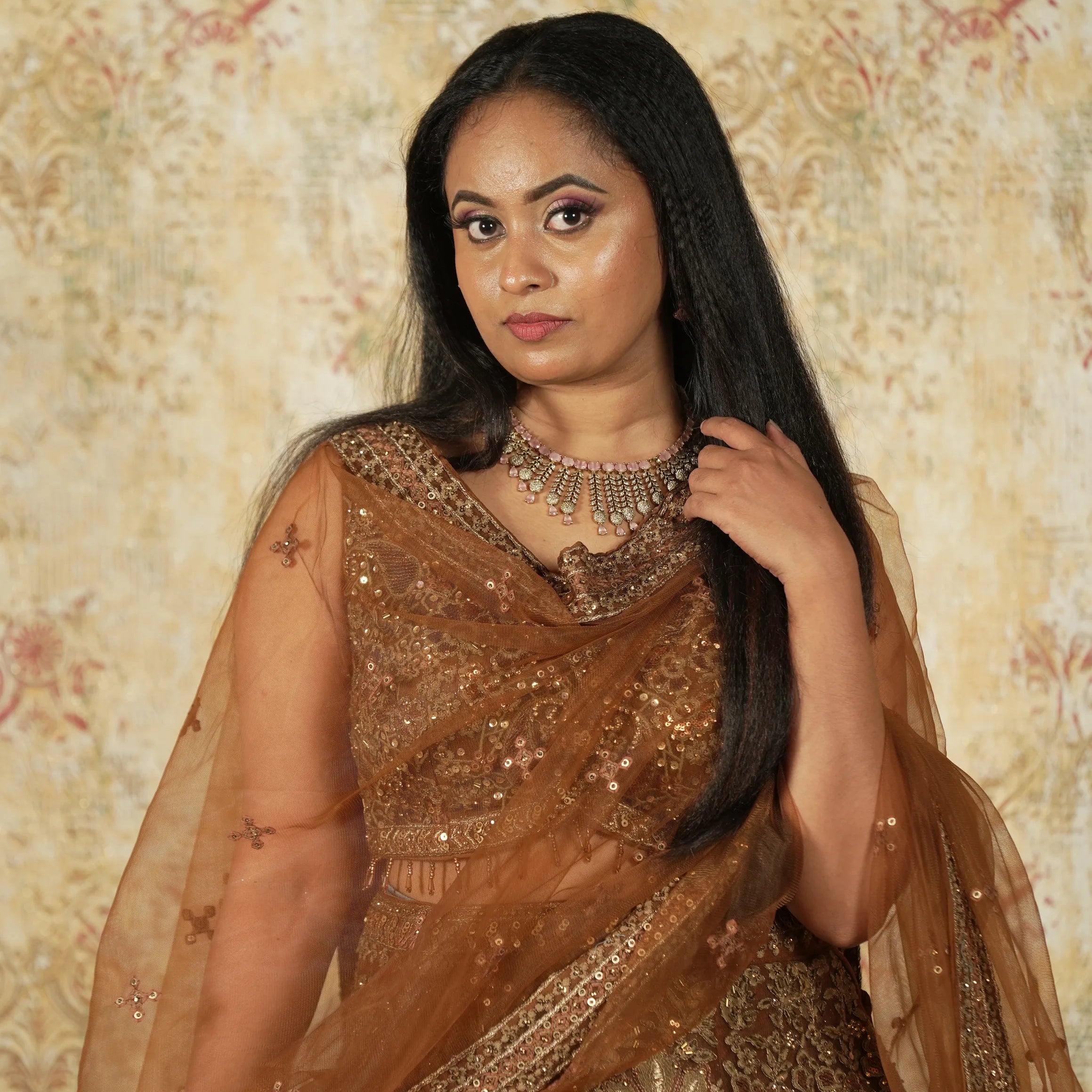 Woman in a traditional Light Coffee Crop Top Lehenga 