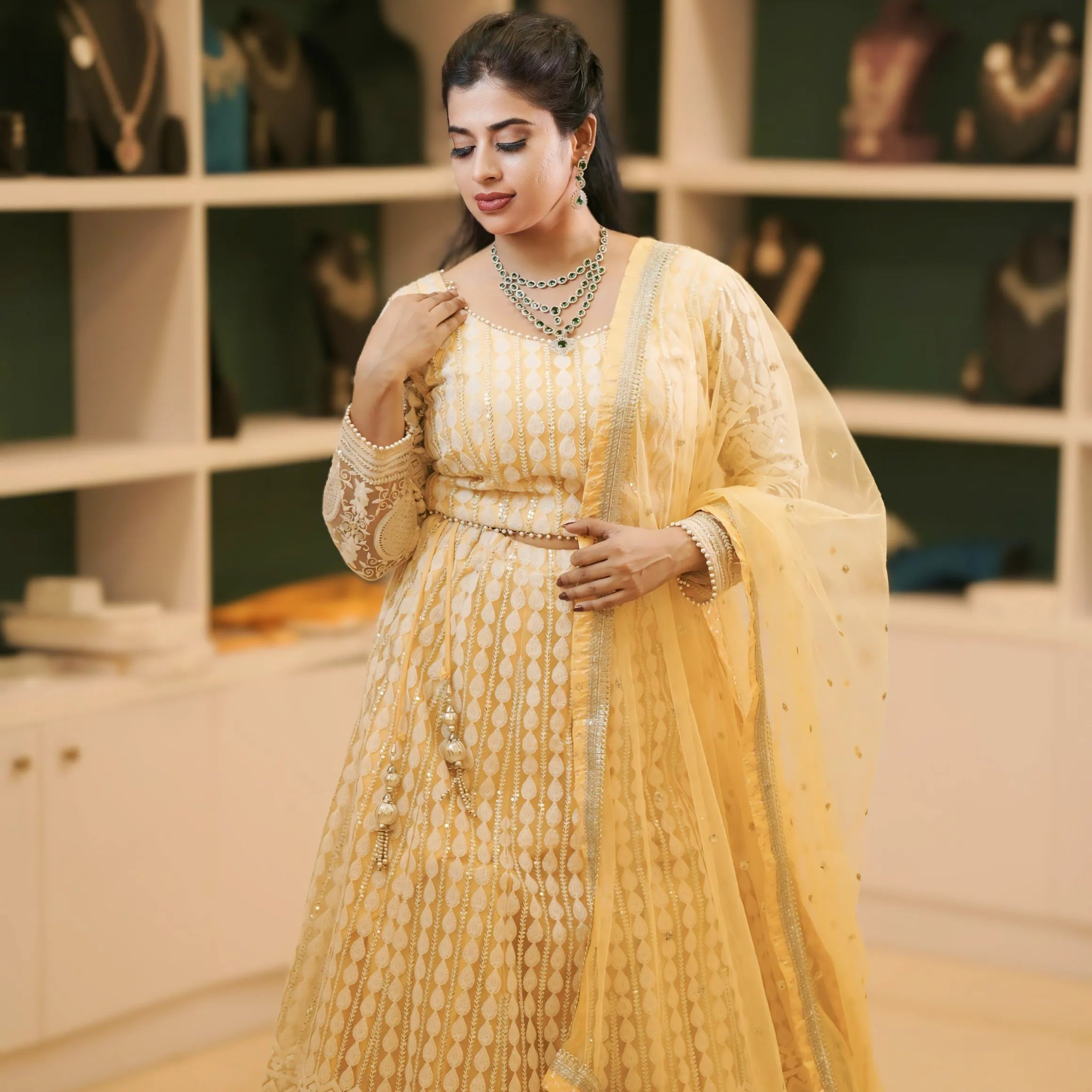 Women wearing Light Yellow Embroidered Lehenga