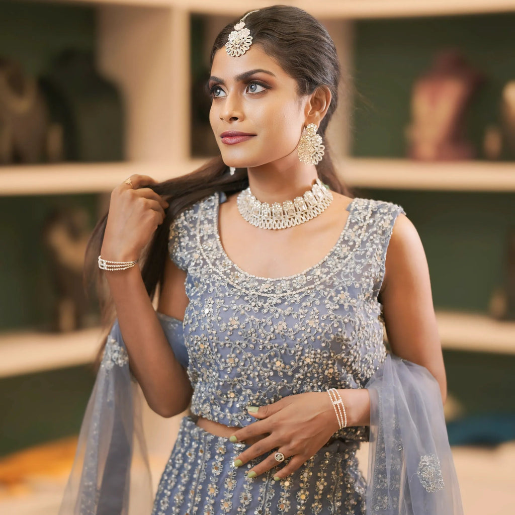 women wearing Dusty Blue Heavy Embroidered Lehenga