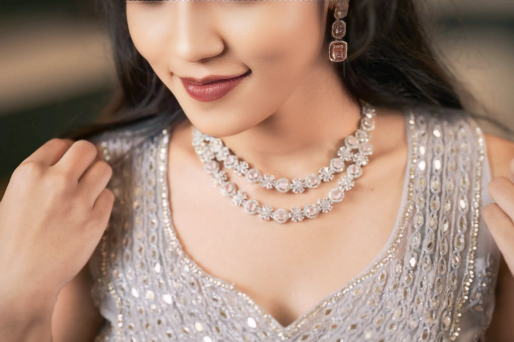 women wearing Silver Grey Embellished Crop Top Lehenga with jewelry 