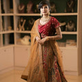 women wearing Red & Gold Bridal Lehenga