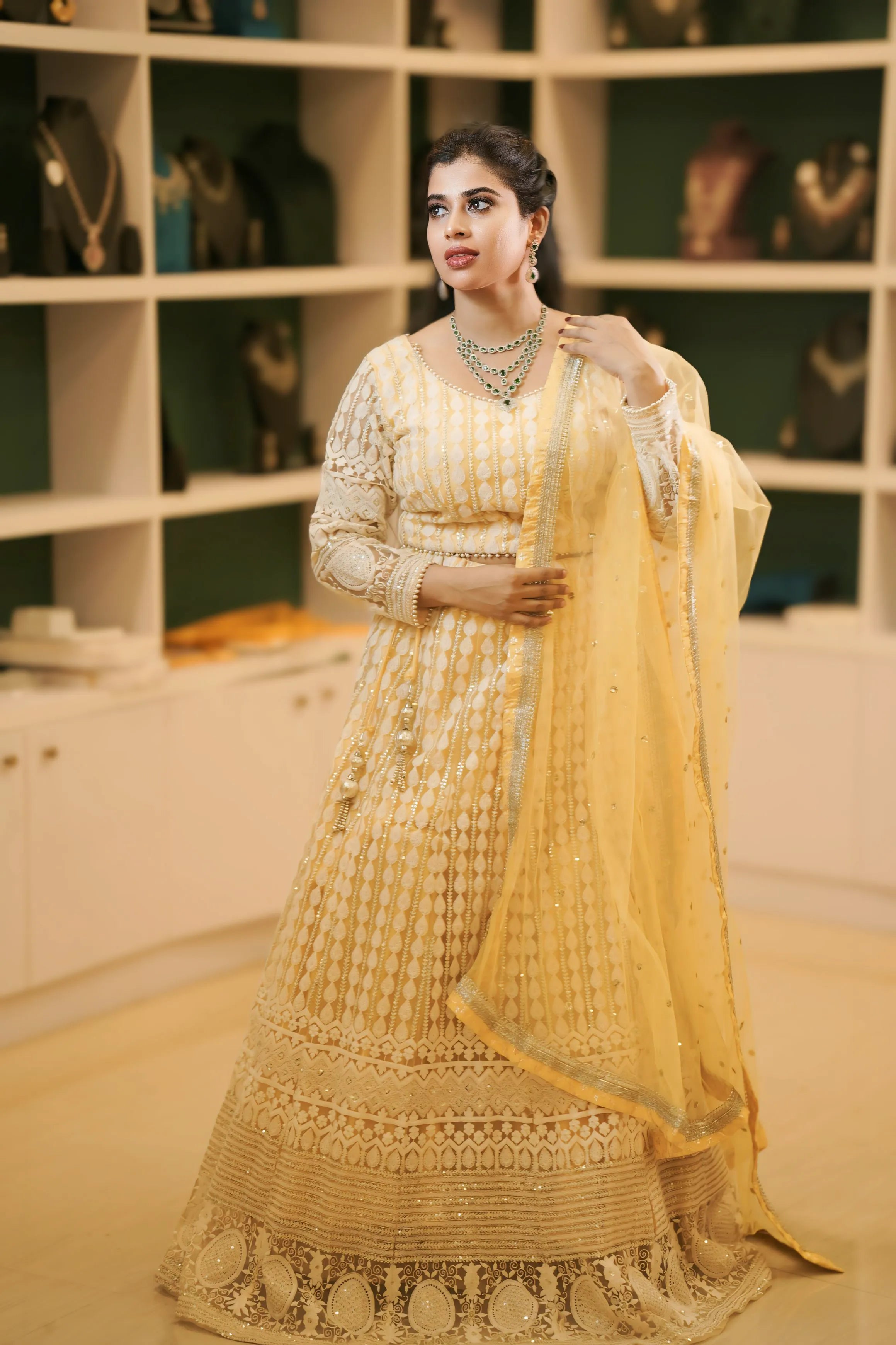 Women wearing Light Yellow Embroidered Lehenga