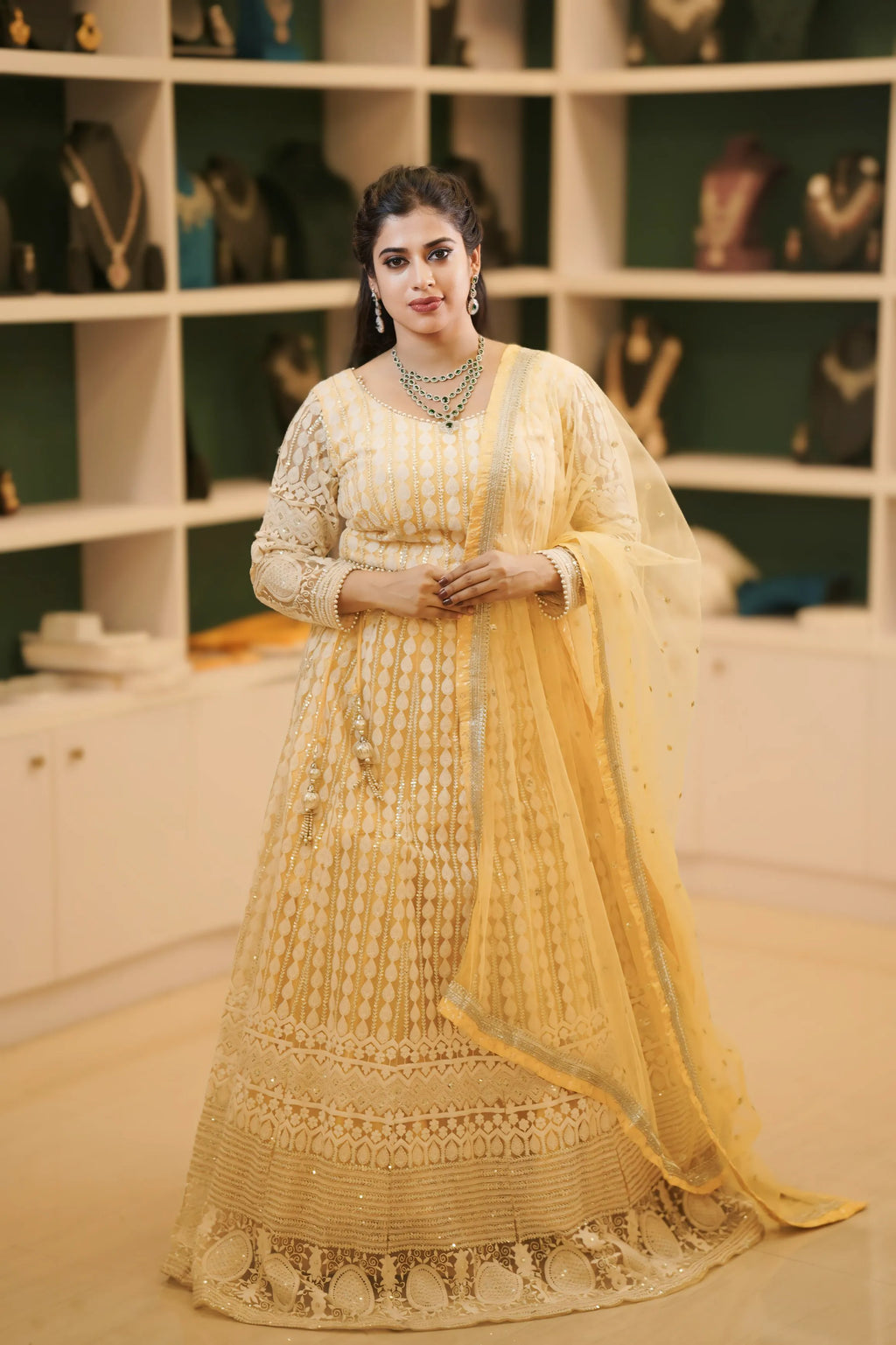 Women wearing Light Yellow Embroidered Lehenga