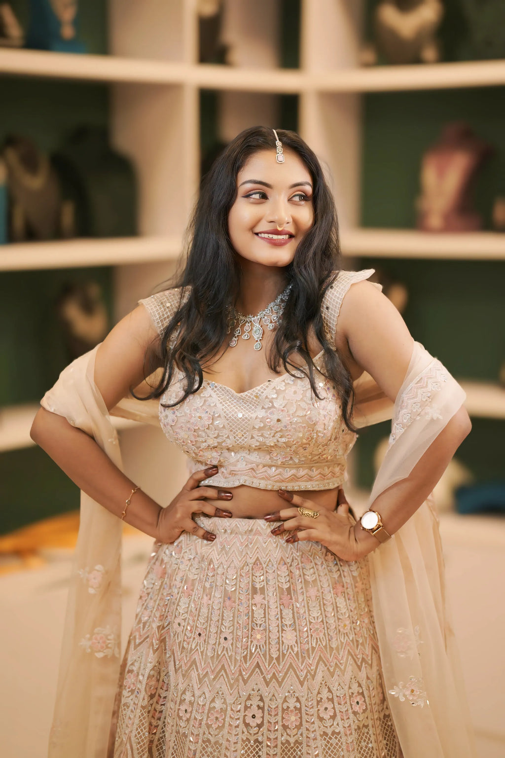 women wearing light pink embroidered lehenga 