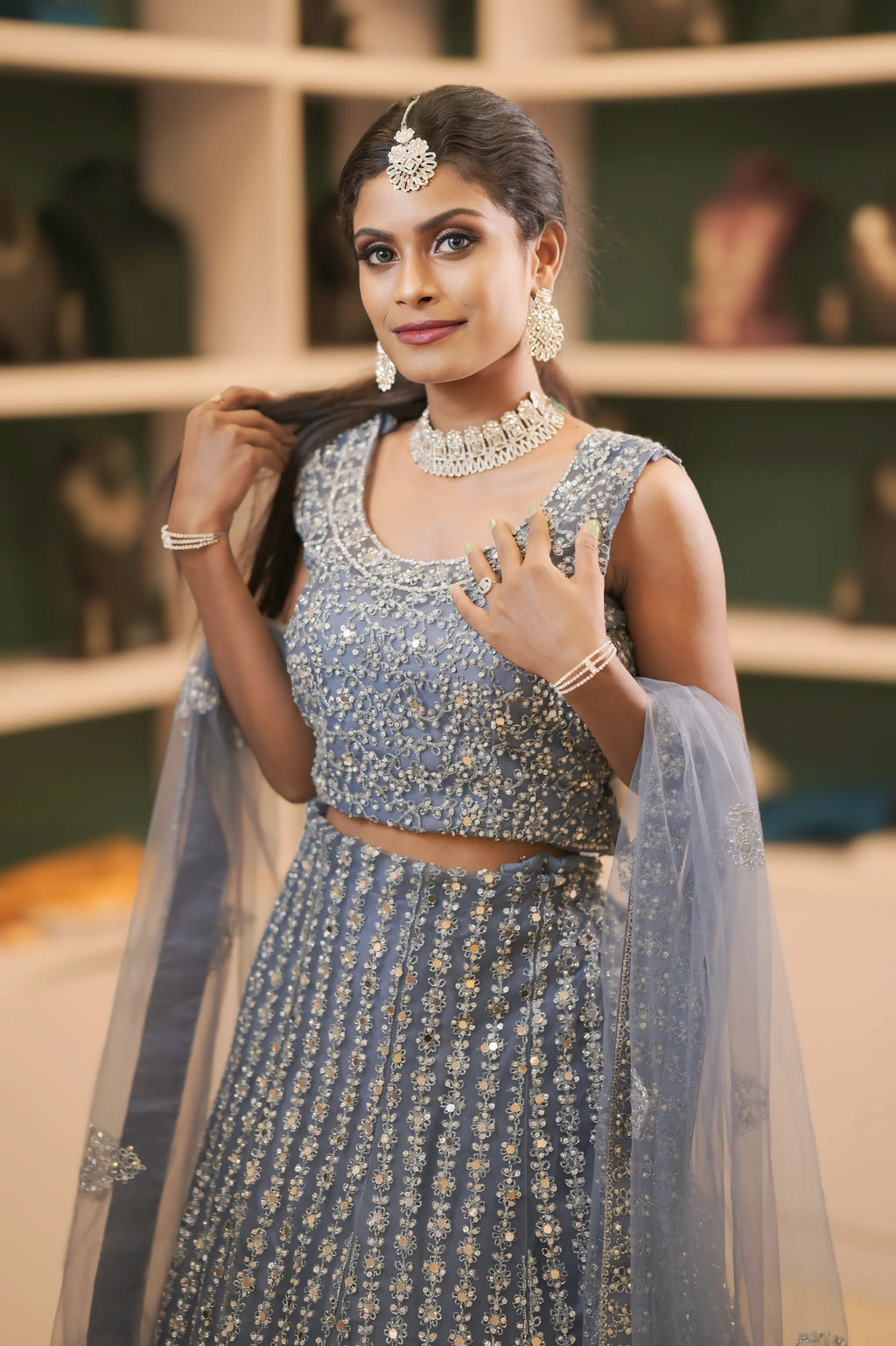 women wearing Dusty Blue Heavy Embroidered Lehenga