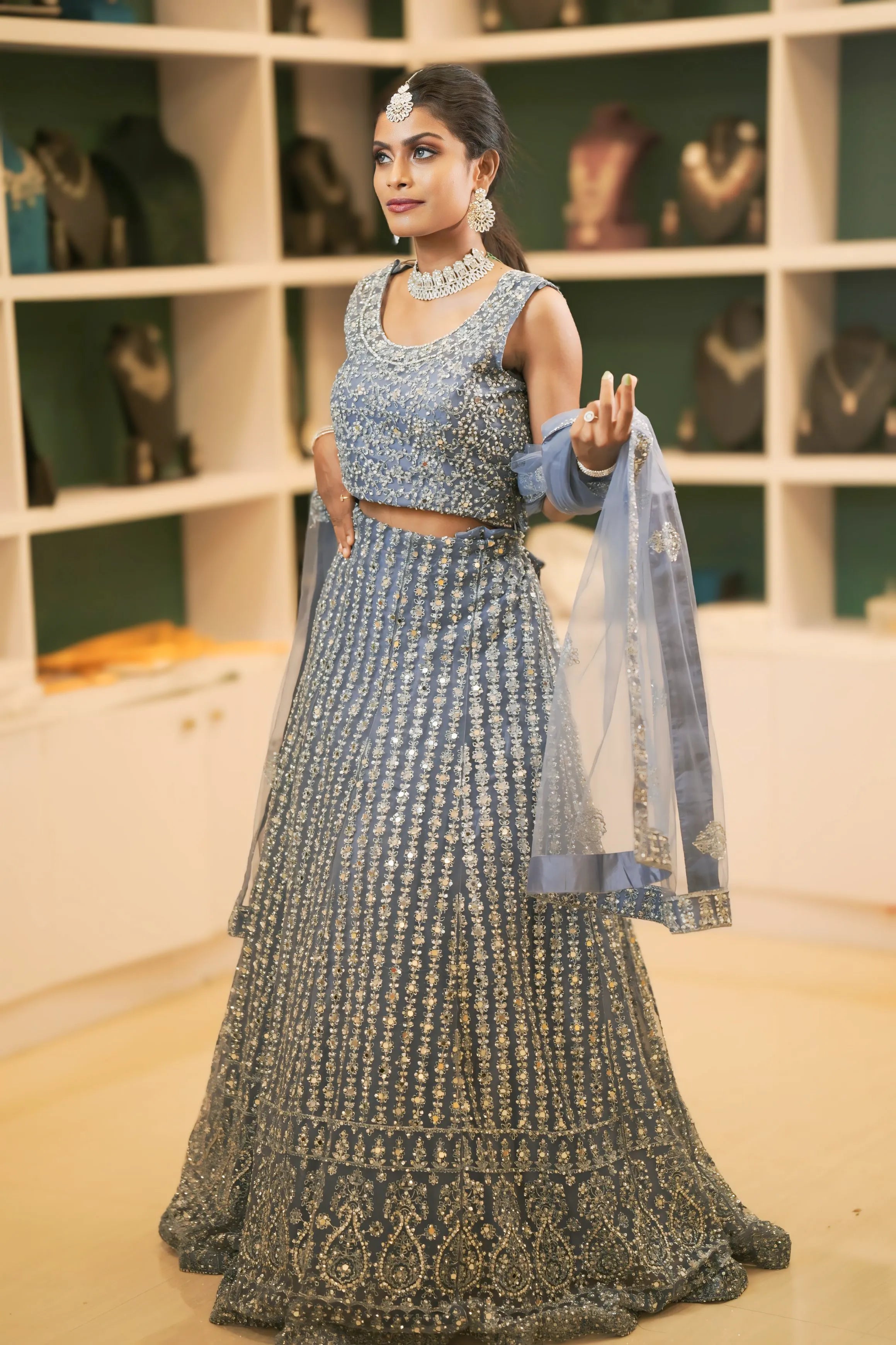 women wearing Dusty Blue Heavy Embroidered Lehenga