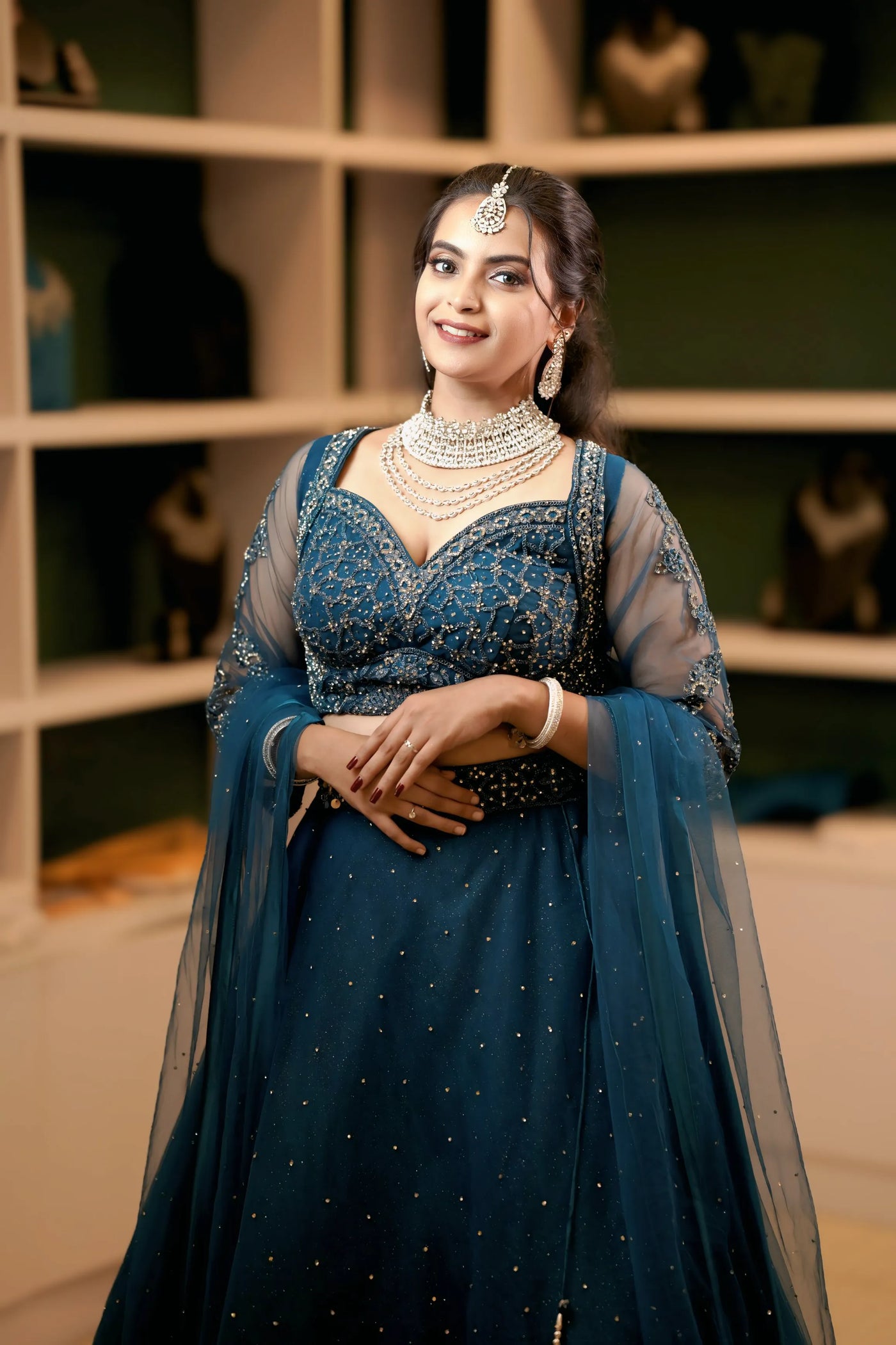 Teal Blue Sequined Net Lehenga