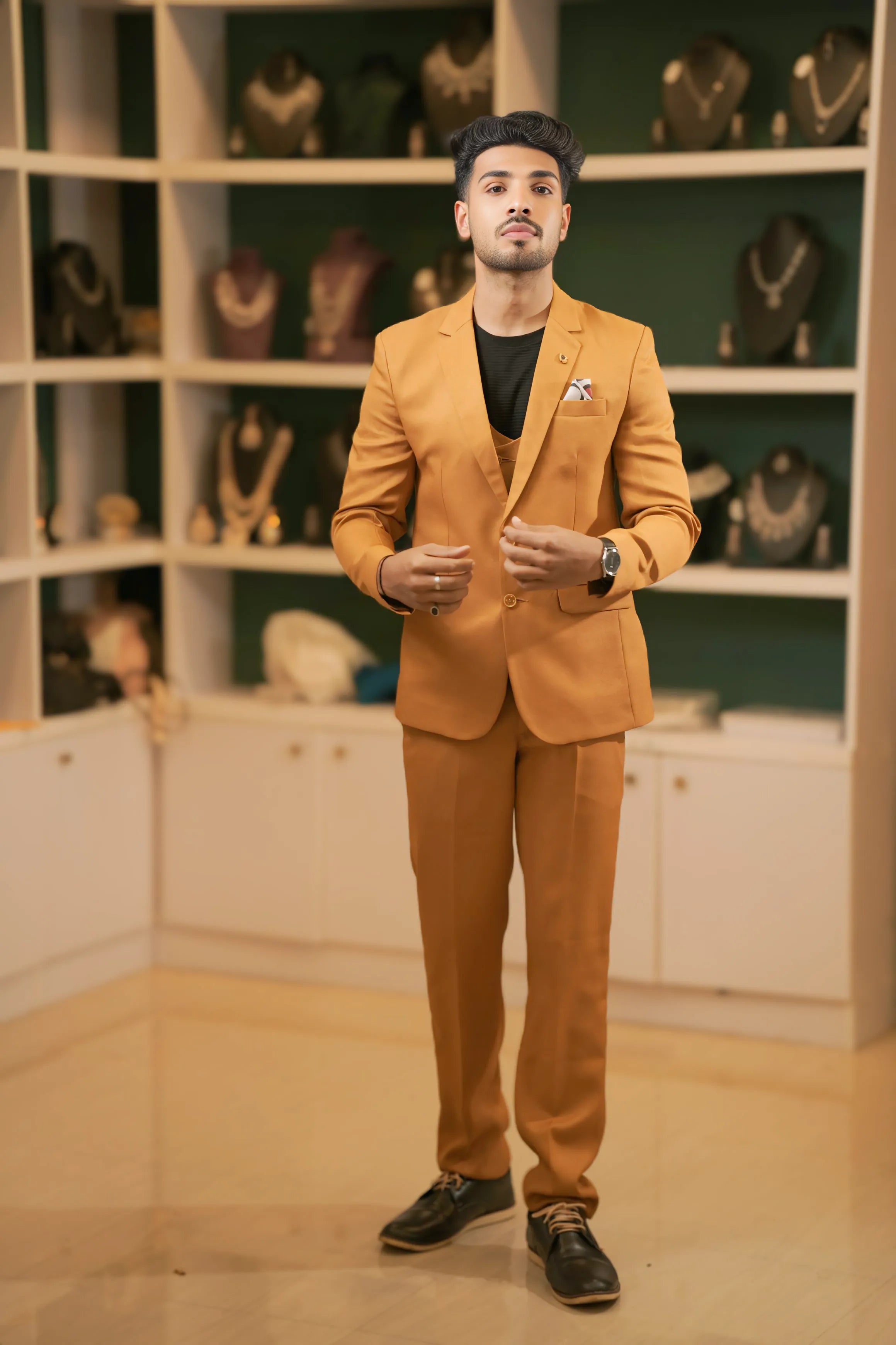groom wearing Mustard Brown Suit for wedding