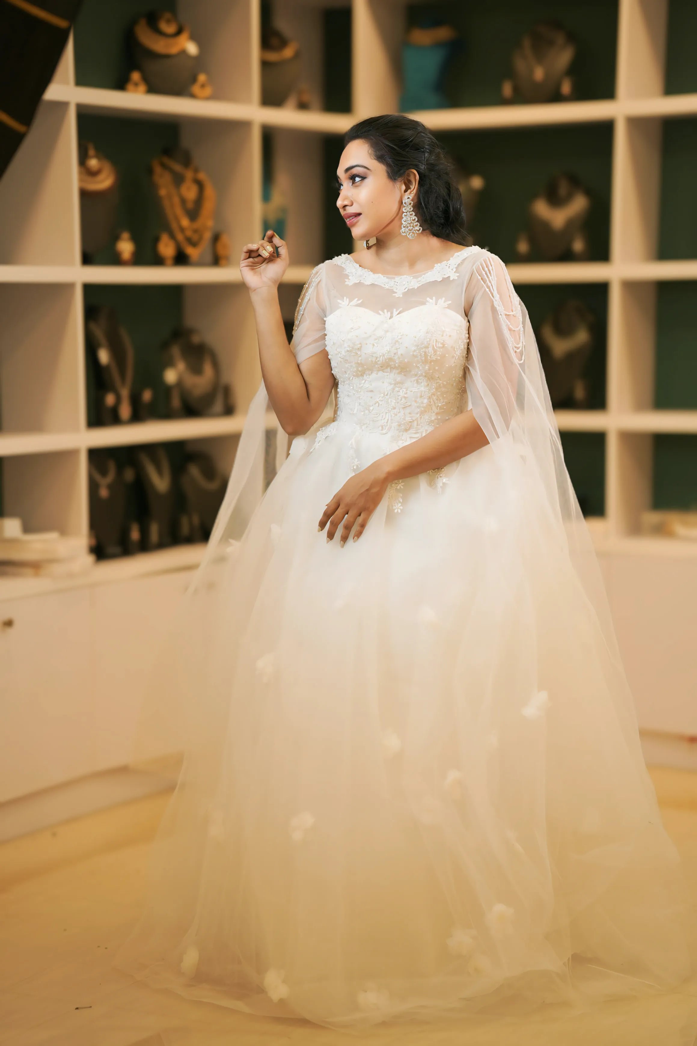 White Off-Shoulder Bridal Gown with Cape Overlay
