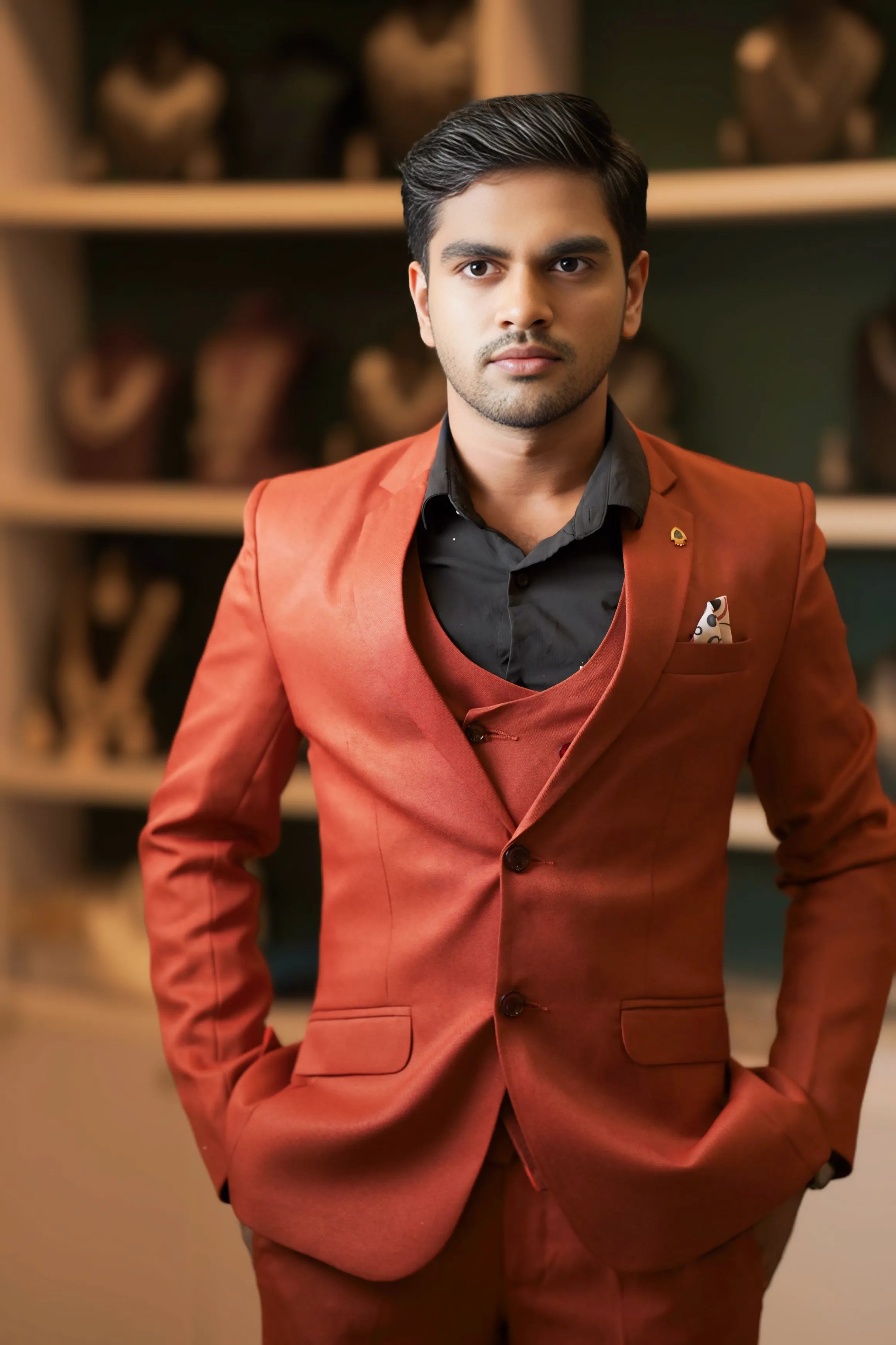 Boy wearing Rust Orange Three-Piece Suit for wedding