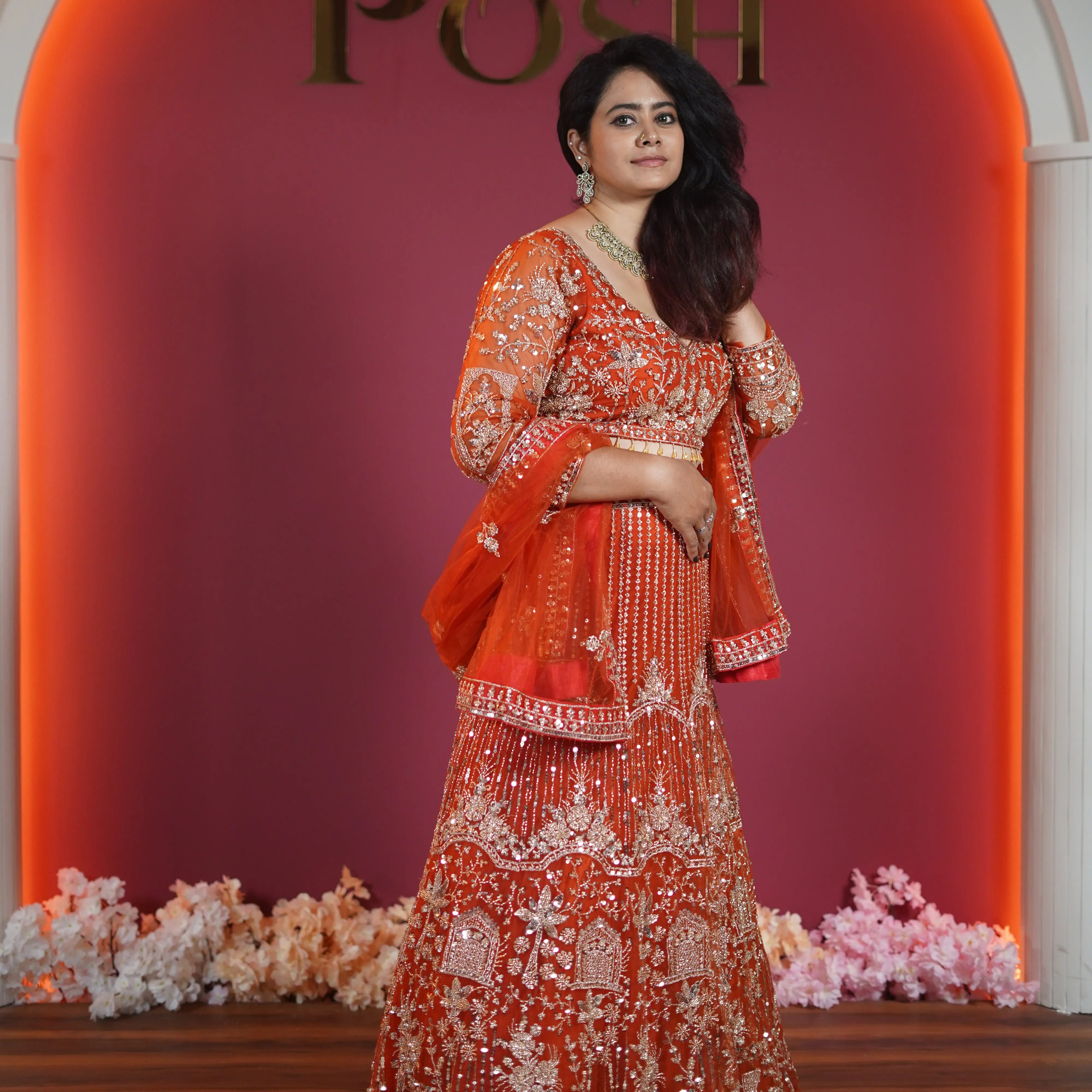 royal orange embroidered bridal lehenga with dupatta available at Posh Wedding Rental Kerala lehenga rental