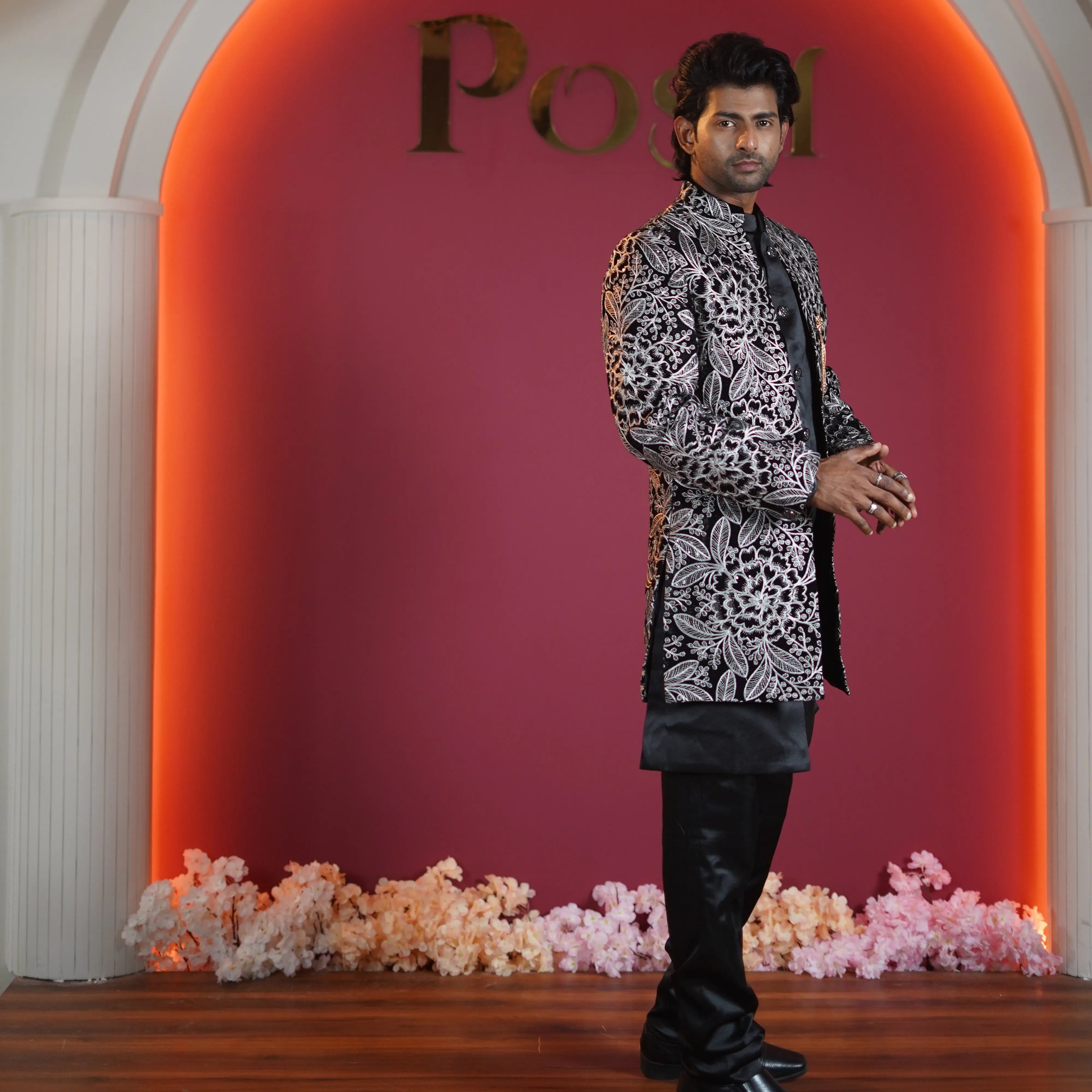 black floral embroidered designer sherwani for groom available at Posh Wedding Rental Kerala sherwani rental
