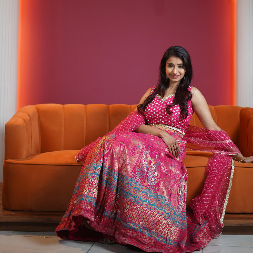 pink designer crop top lehenga with peacock motif available at Posh Wedding Rental Kerala